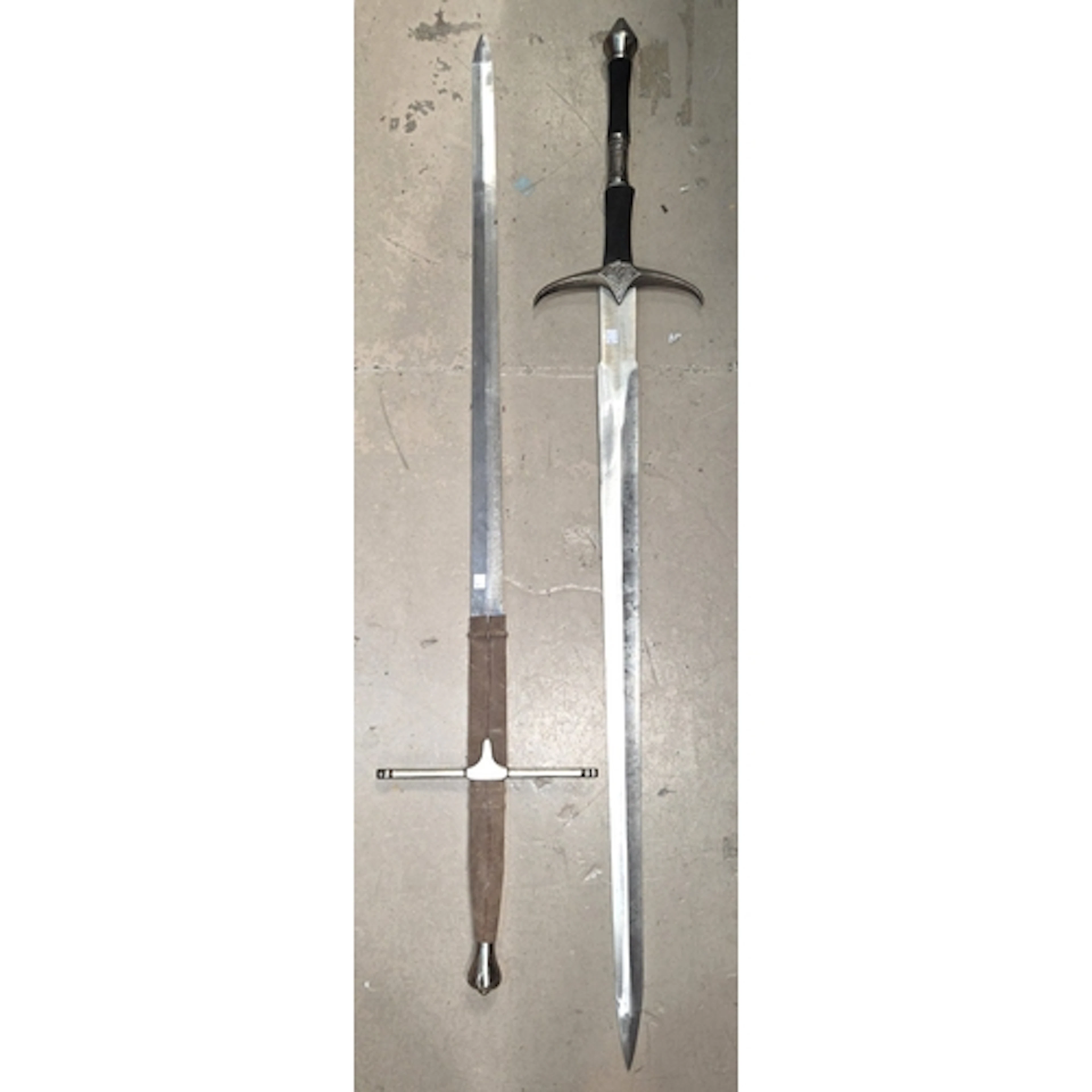 Two large Claymore type display swords, 130cm length