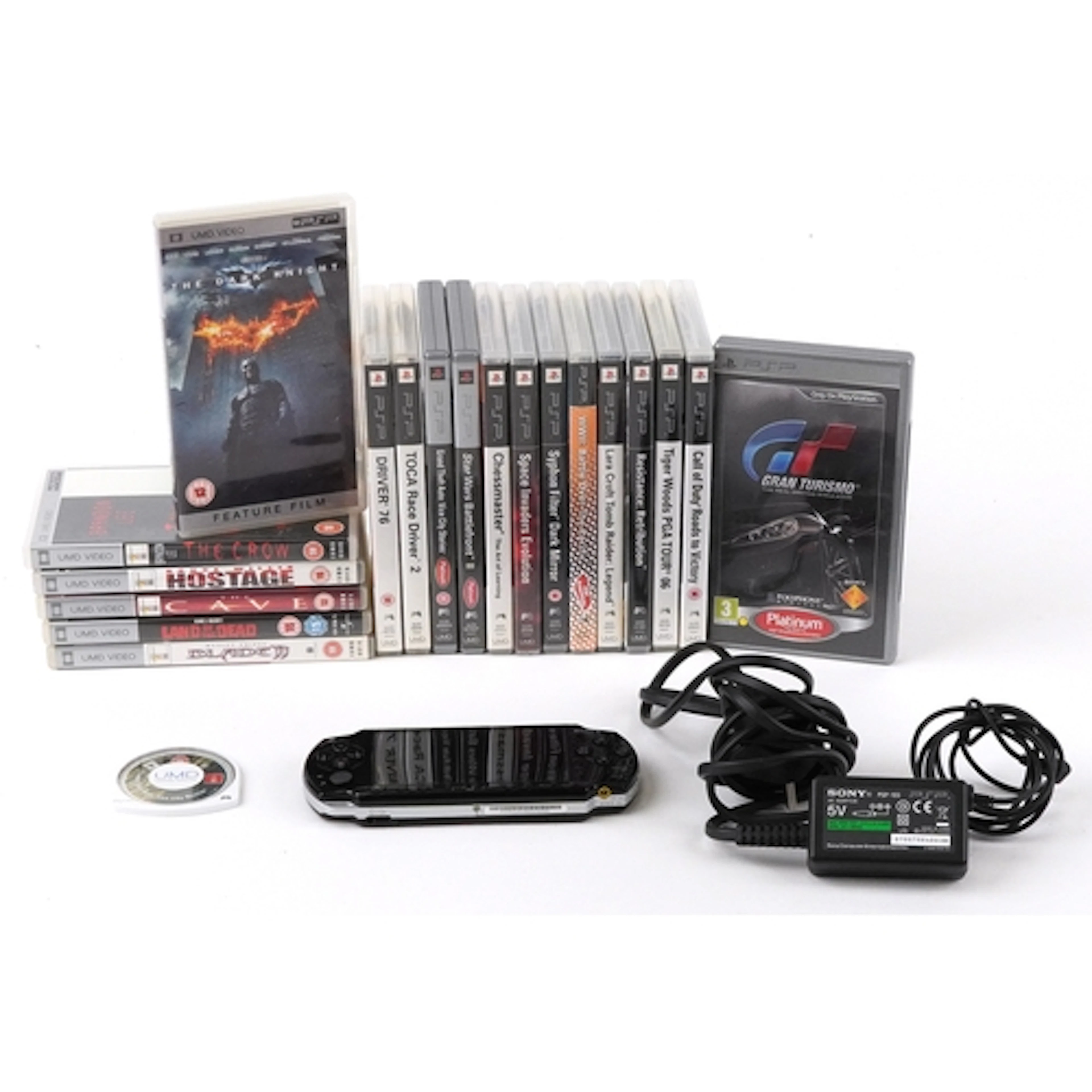 Sony PSP hand held games console with charger lead and a sel...