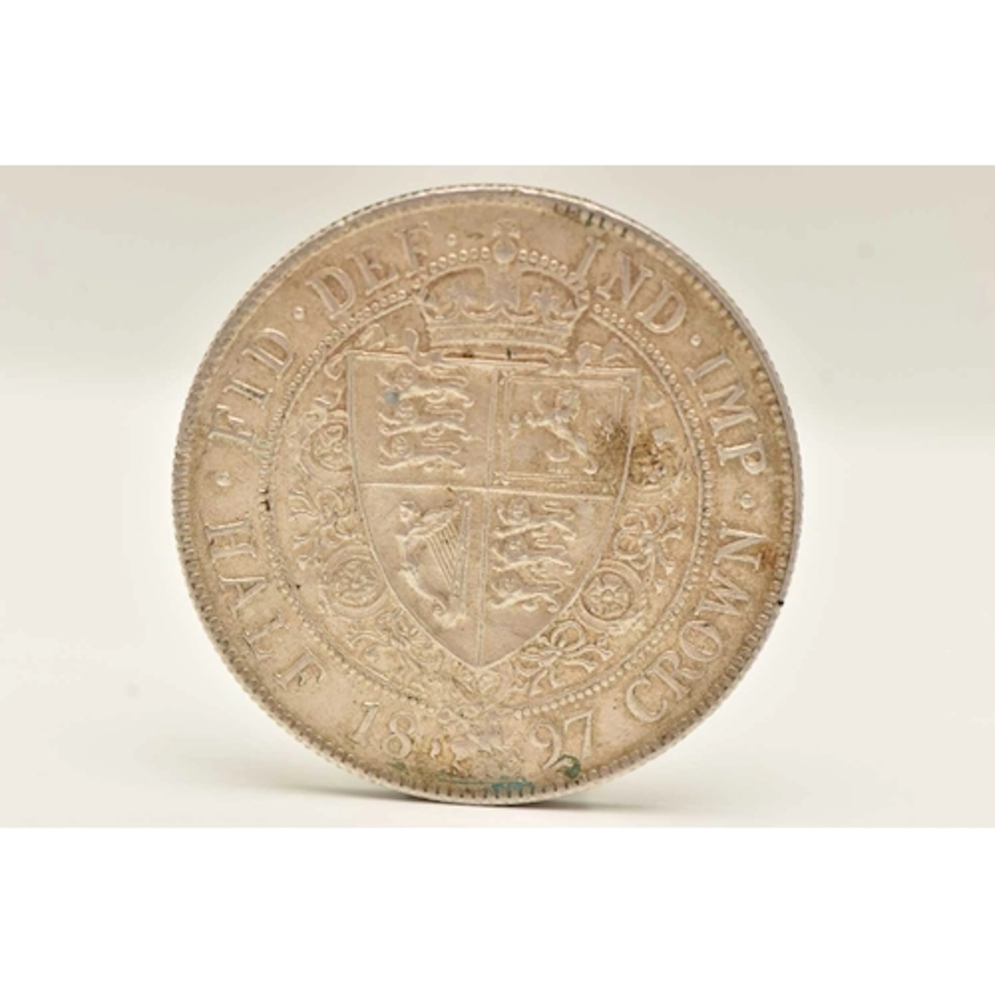 A VICTORIAN SILVER HALF CROWN COIN, dated 1897, approximate ...