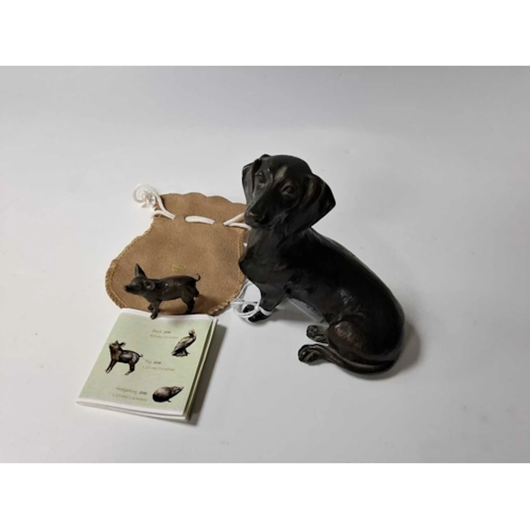 TWO SMALL DETAILED PATINATED BRONZE ANIMALS, comprising a se...