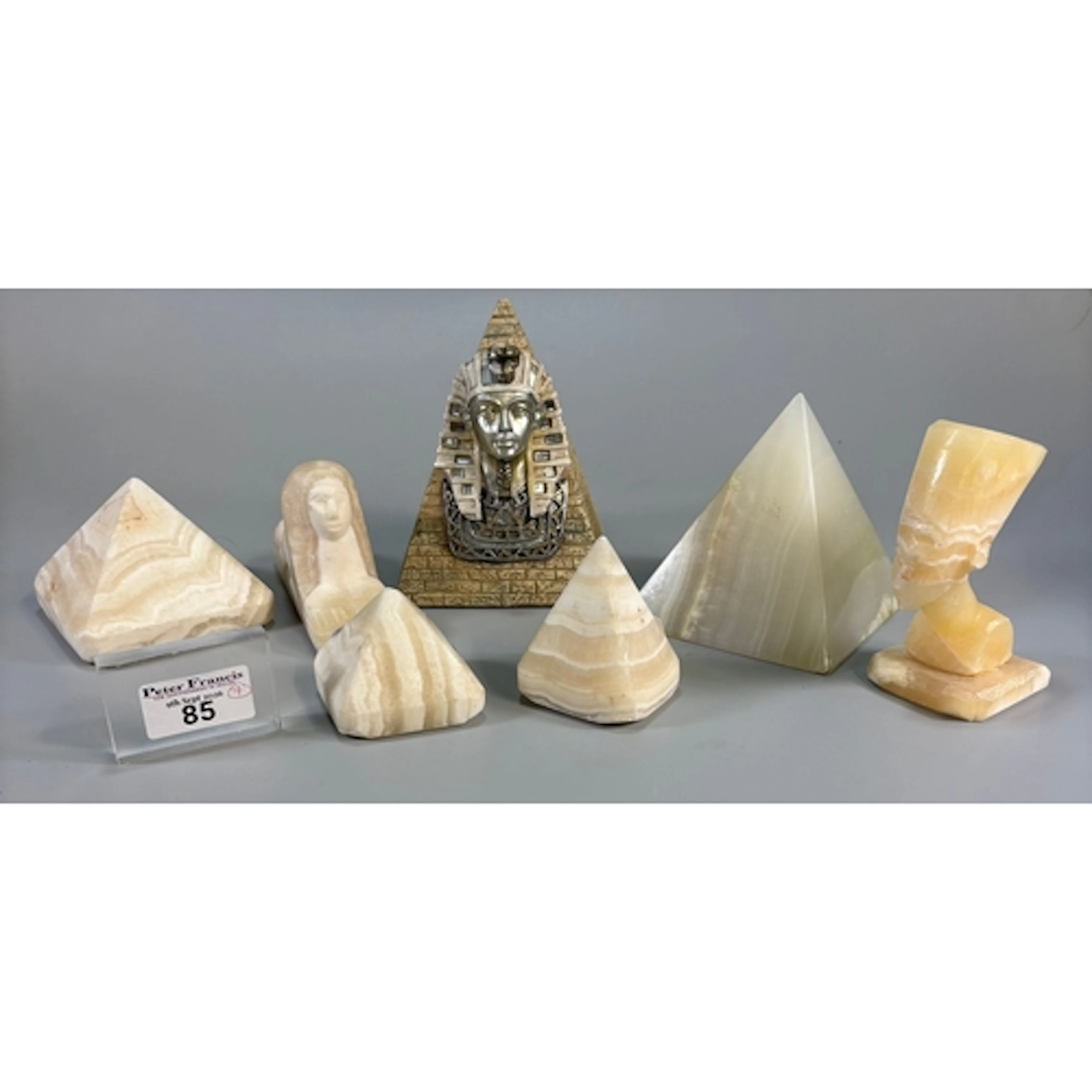Collection of onyx and alabaster Egyptian themed busts and f...