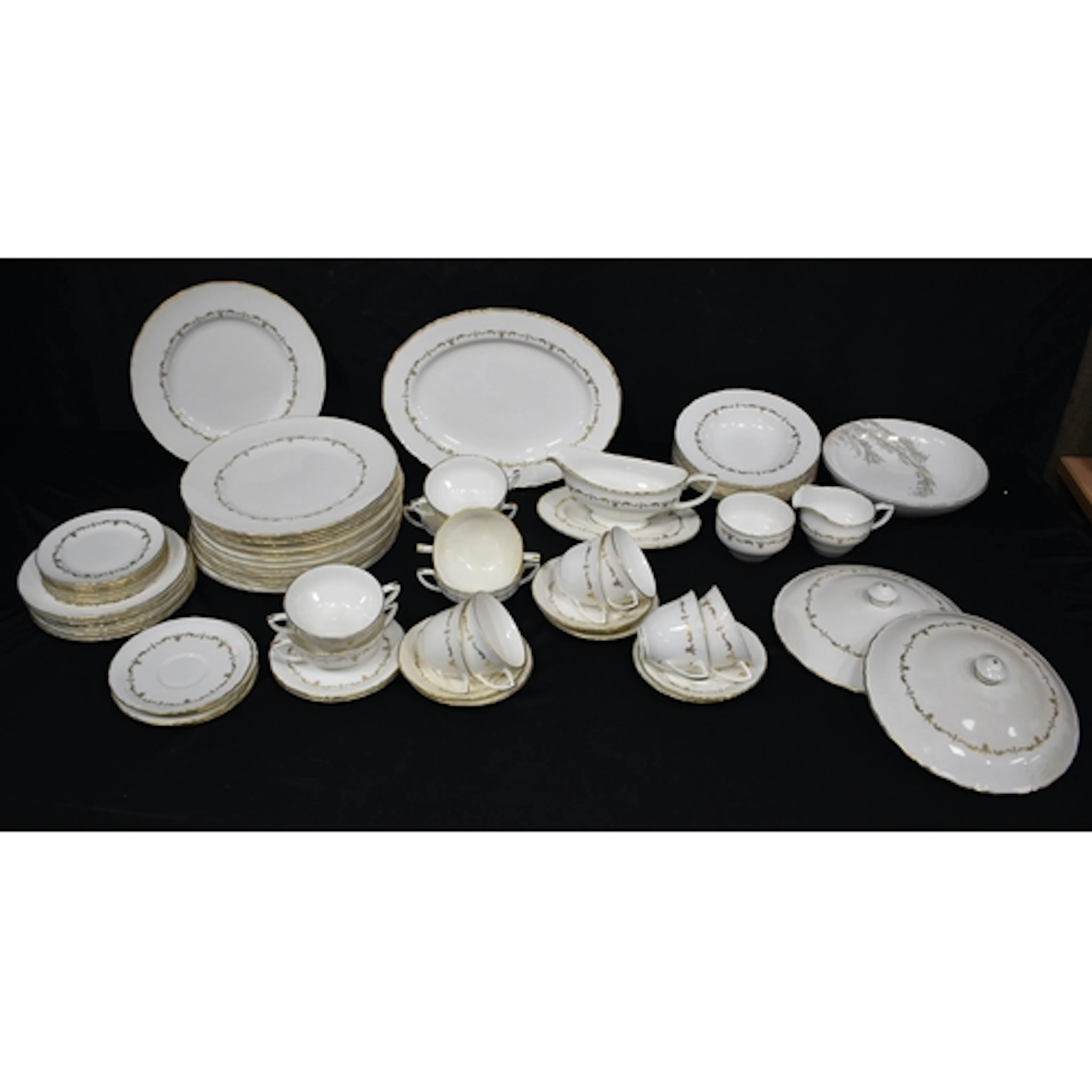 A Royal Worcester Gold Chantilly porcelain part dinner servi...