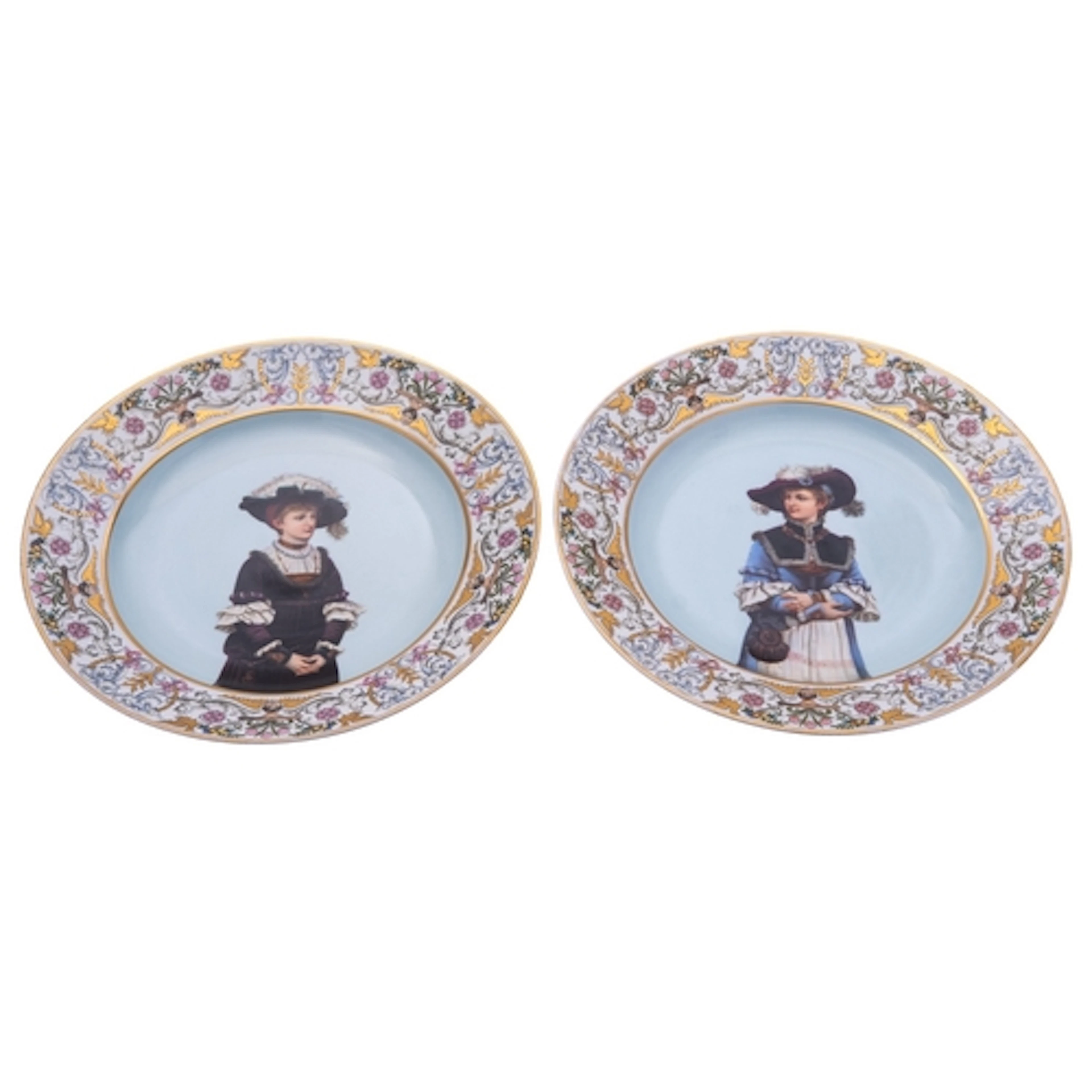 A pair of Continental porcelain plates each decorated with a...