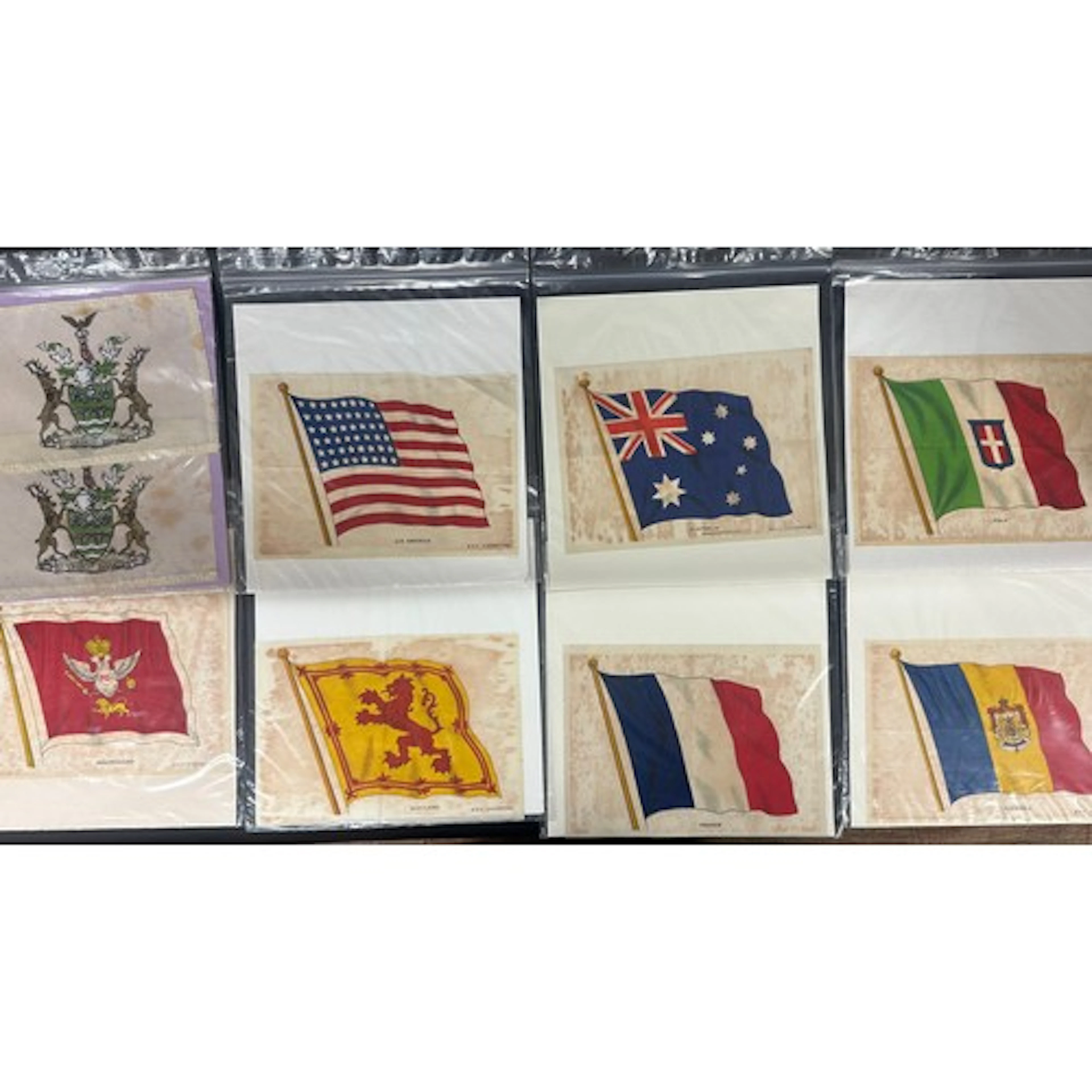 Seven large B.D.V flag silks, including the USA, France, Mon...