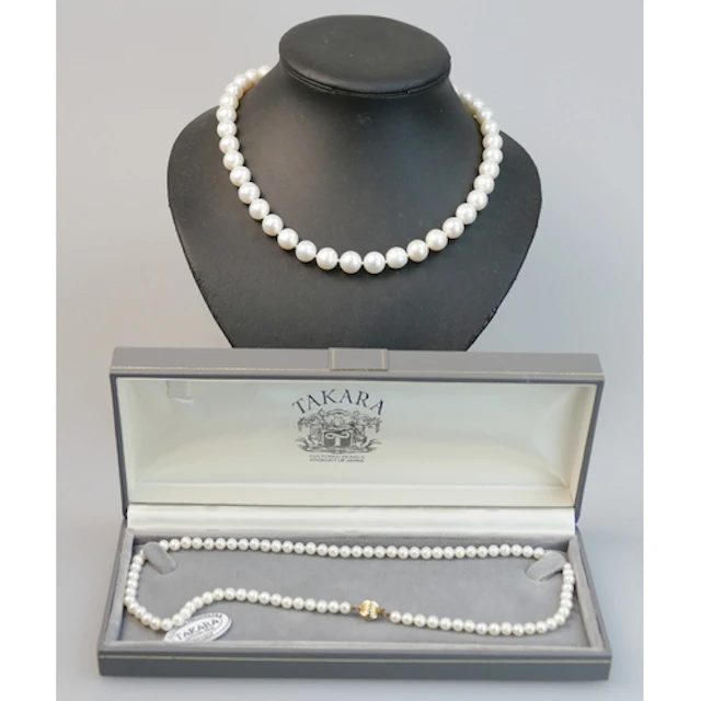 A large cultured pearl necklace with an 18ct yellow gold cla...