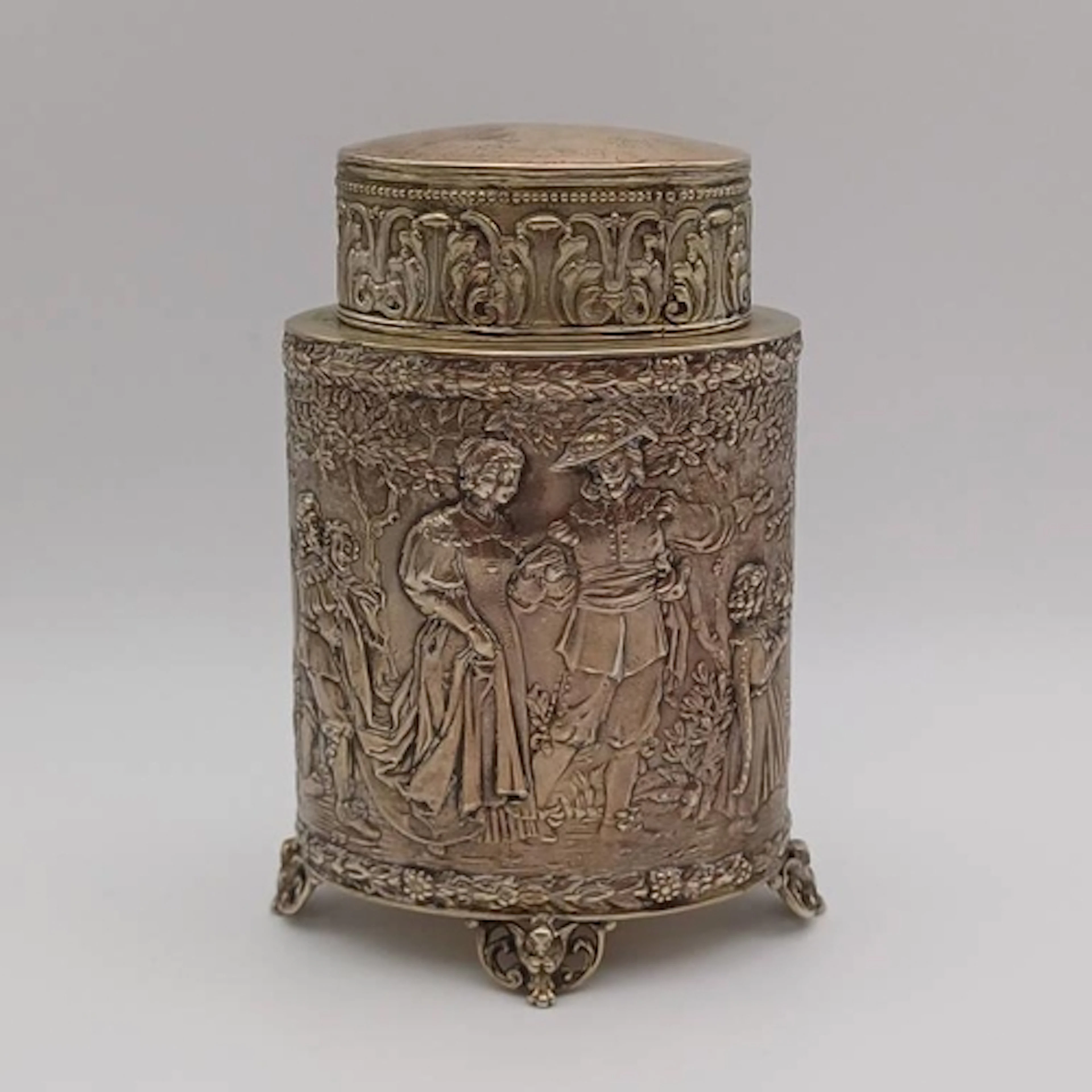 A 19TH CENTURY DUTCH SILVER TEA CADDY WITH EMBOSSED FIGURAL ...