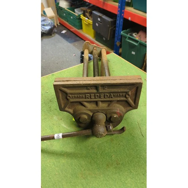 Cast-iron bench vice by Record, of rectangular jaw with rais...