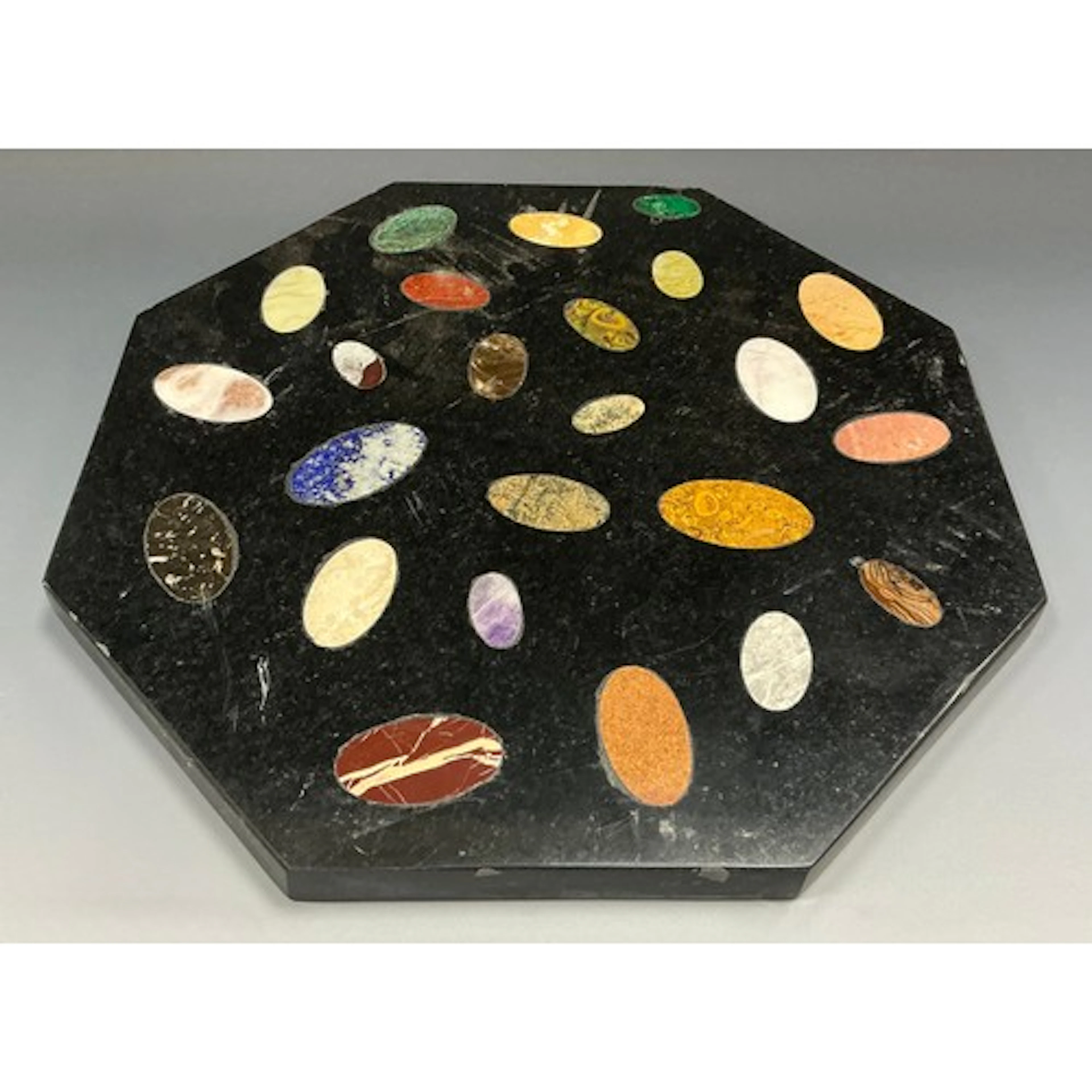 A pietra dura octagonal table top, pietra dura inlaid with m...