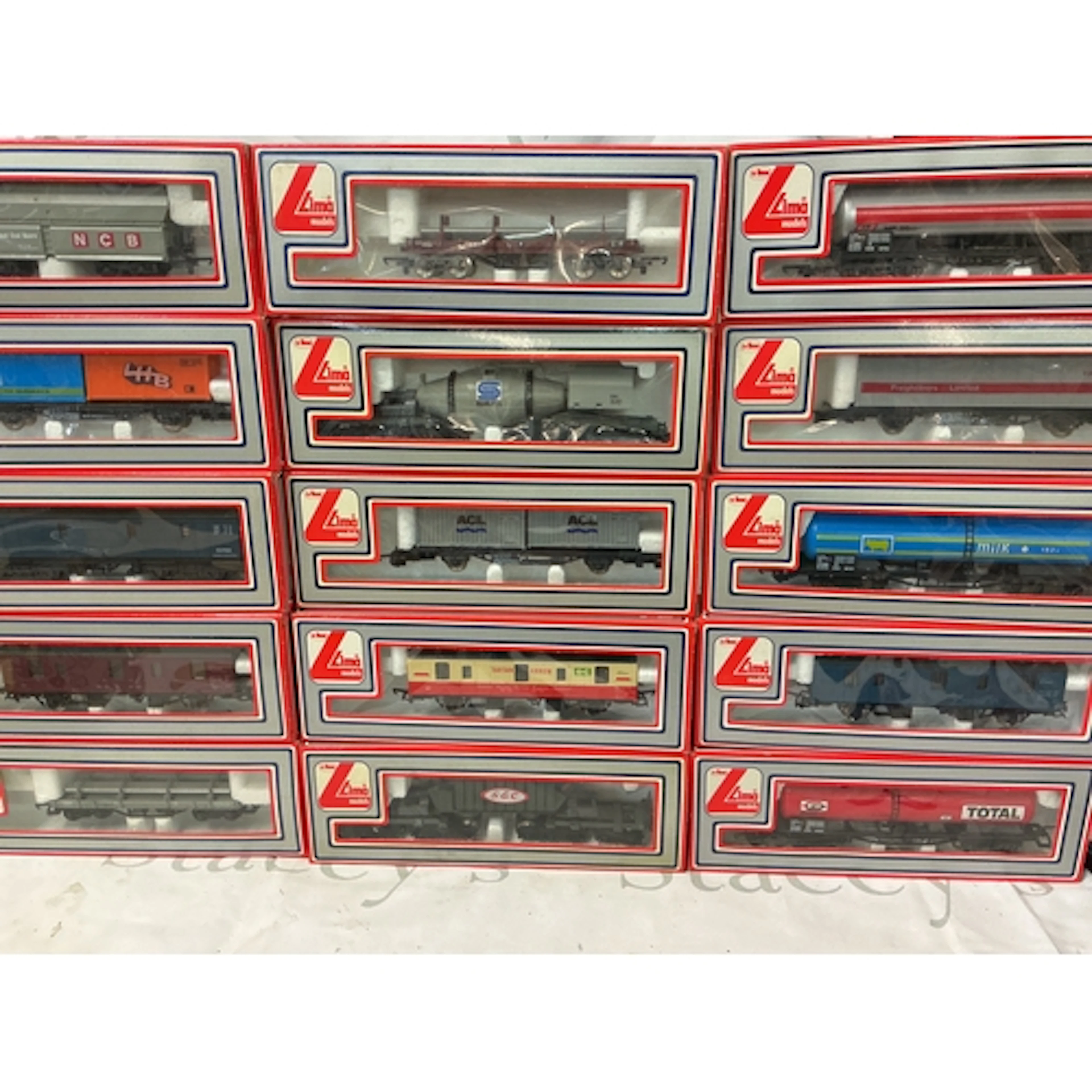 A Collection Of Boxed Lima 00 Gauge Wagons And Coaches. No R...