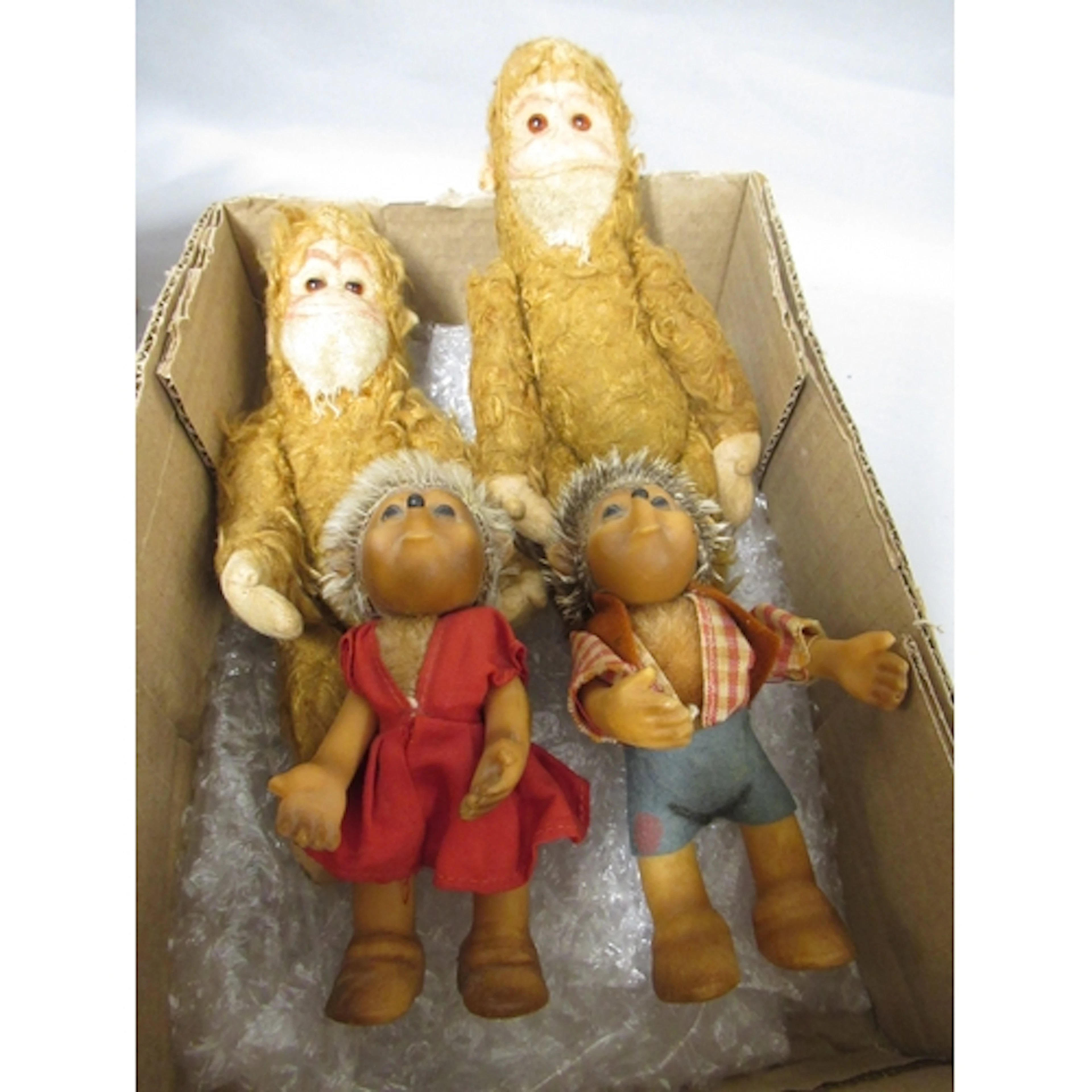 Two Steiff ' Mecki ' hedgehogs, together with two Steiff mon...