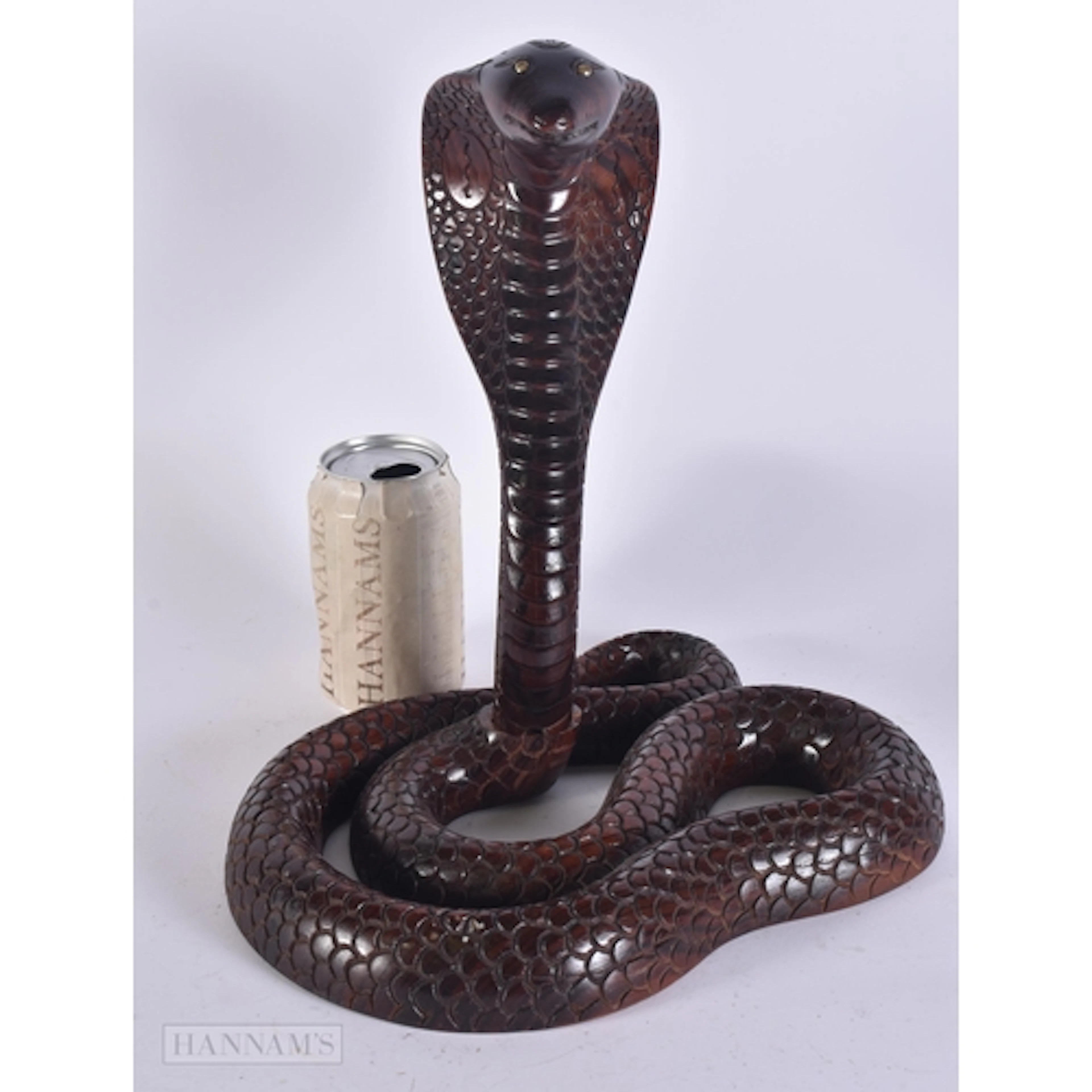 AN UNUSUAL INDIAN CARVED HARDWOOD COBRA. 32 cm x 24 cm.