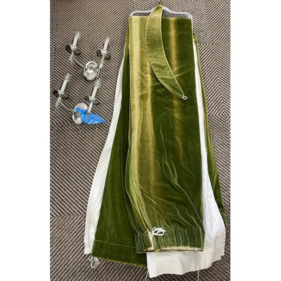 Pair of green velvet curtains with linings, each curtain mea...