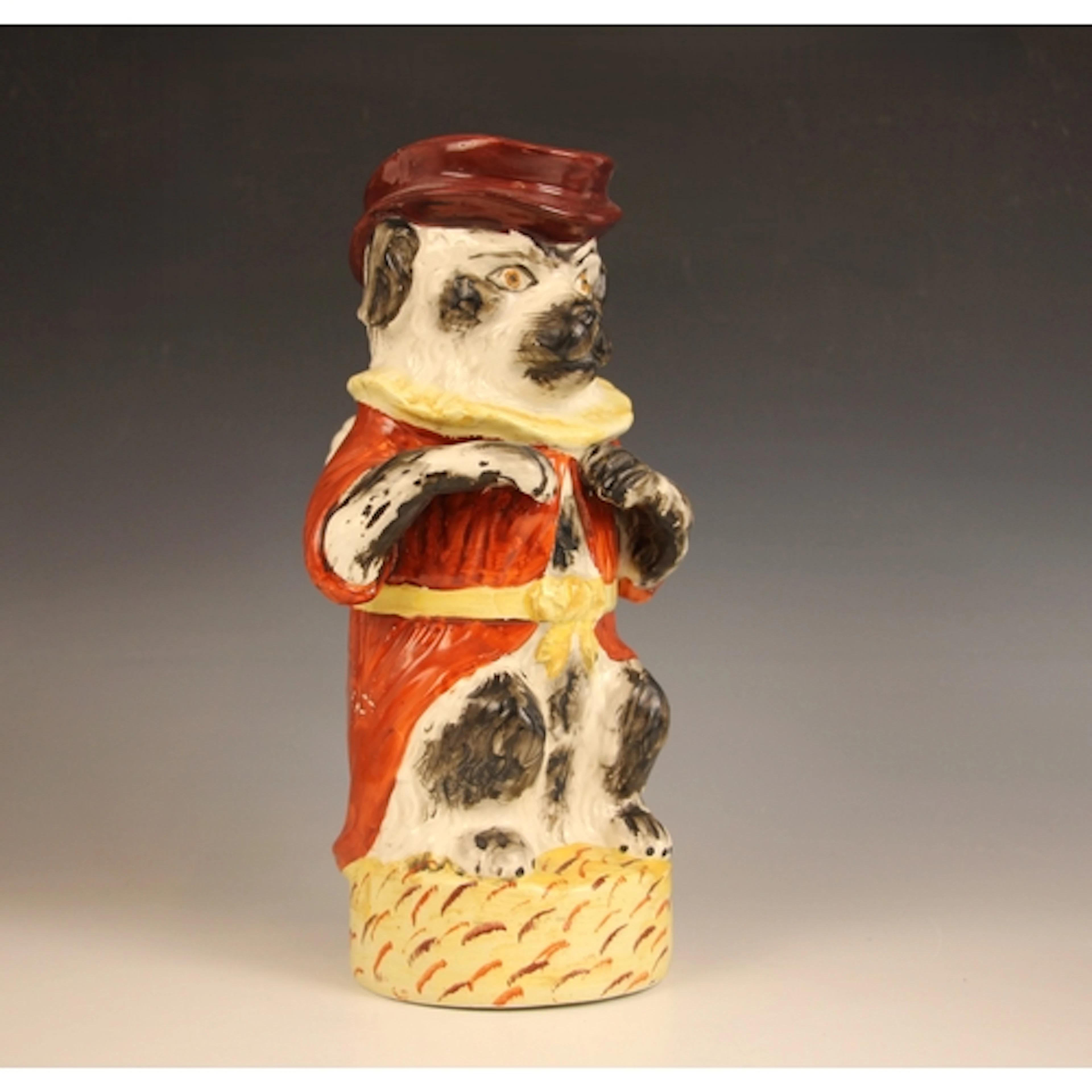 A Staffordshire polychrome glazed earthenware anthropomorphi...
