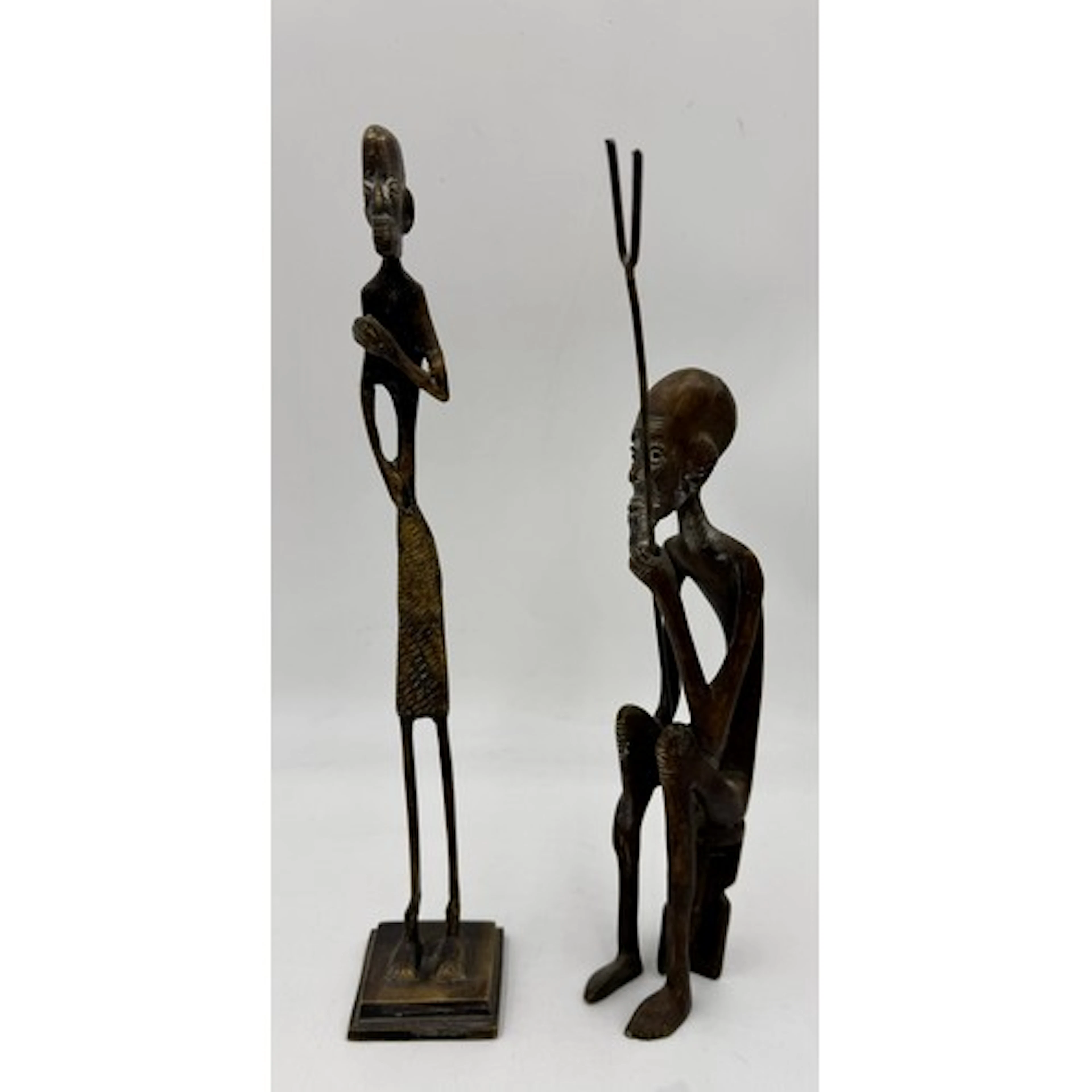 Two 20thC bronze African figures, 28cm h. (2).