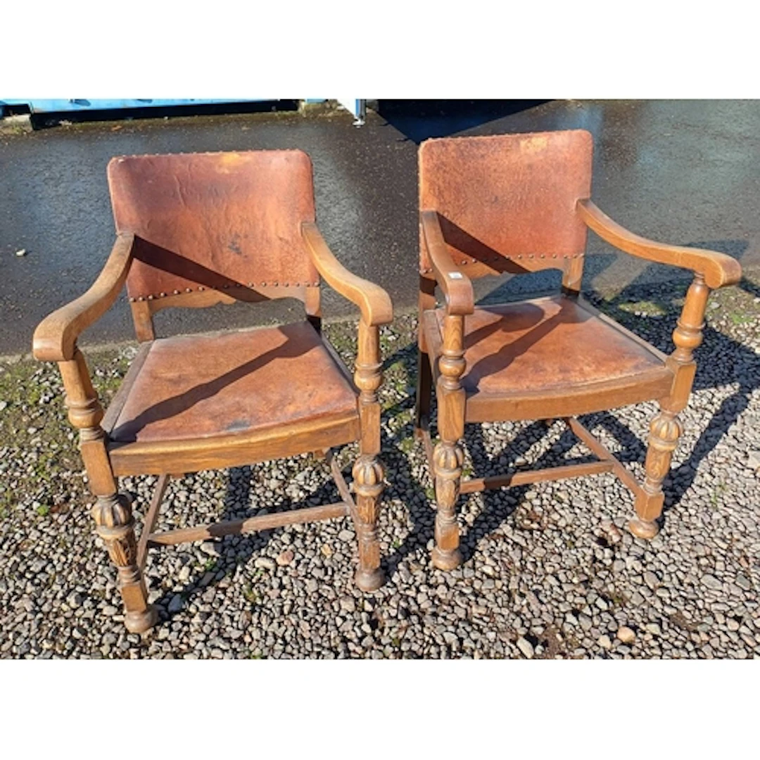 PAIR OF EARLY-MID 20TH CENTURY OAK OPEN ARMCHAIRS WITH LEATH...