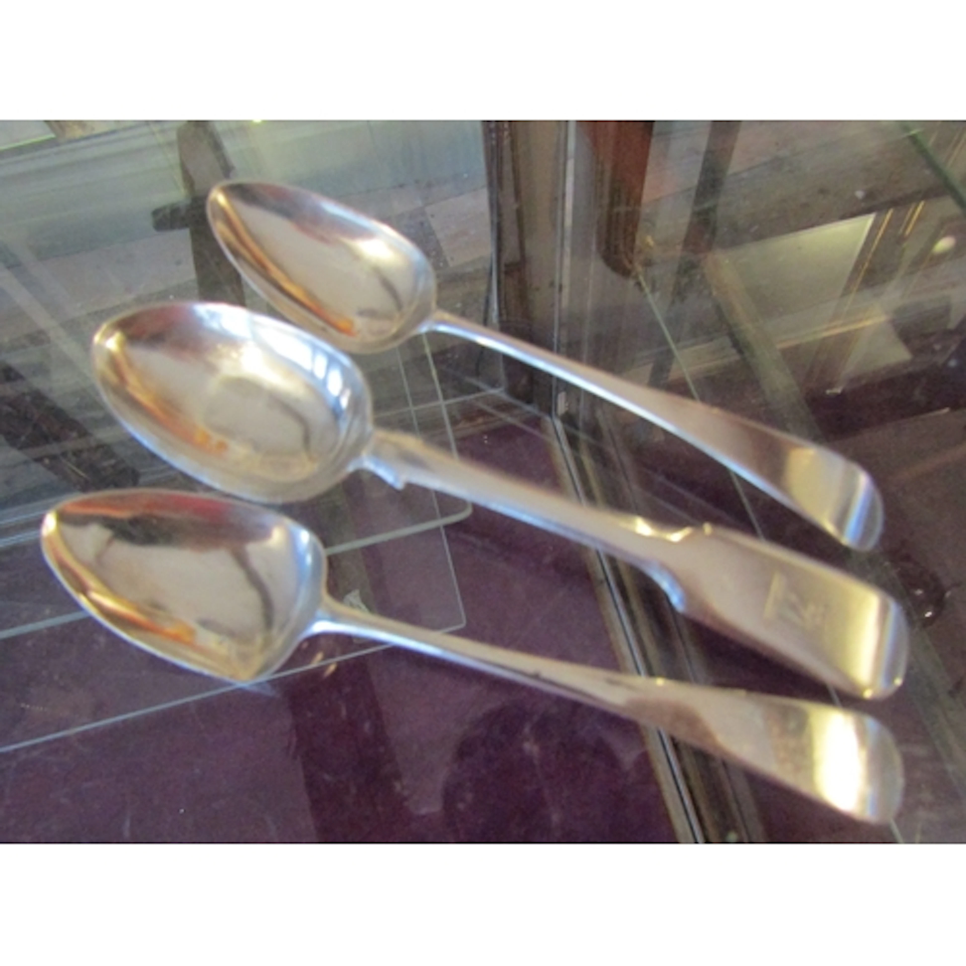 Three Silver Teaspoons