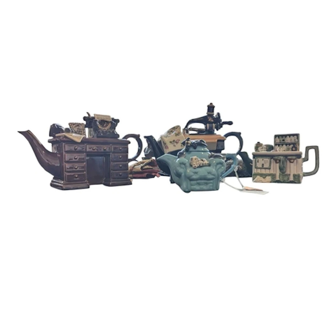 Cardew Design - A collection of ceramic novelty teapots. Car...
