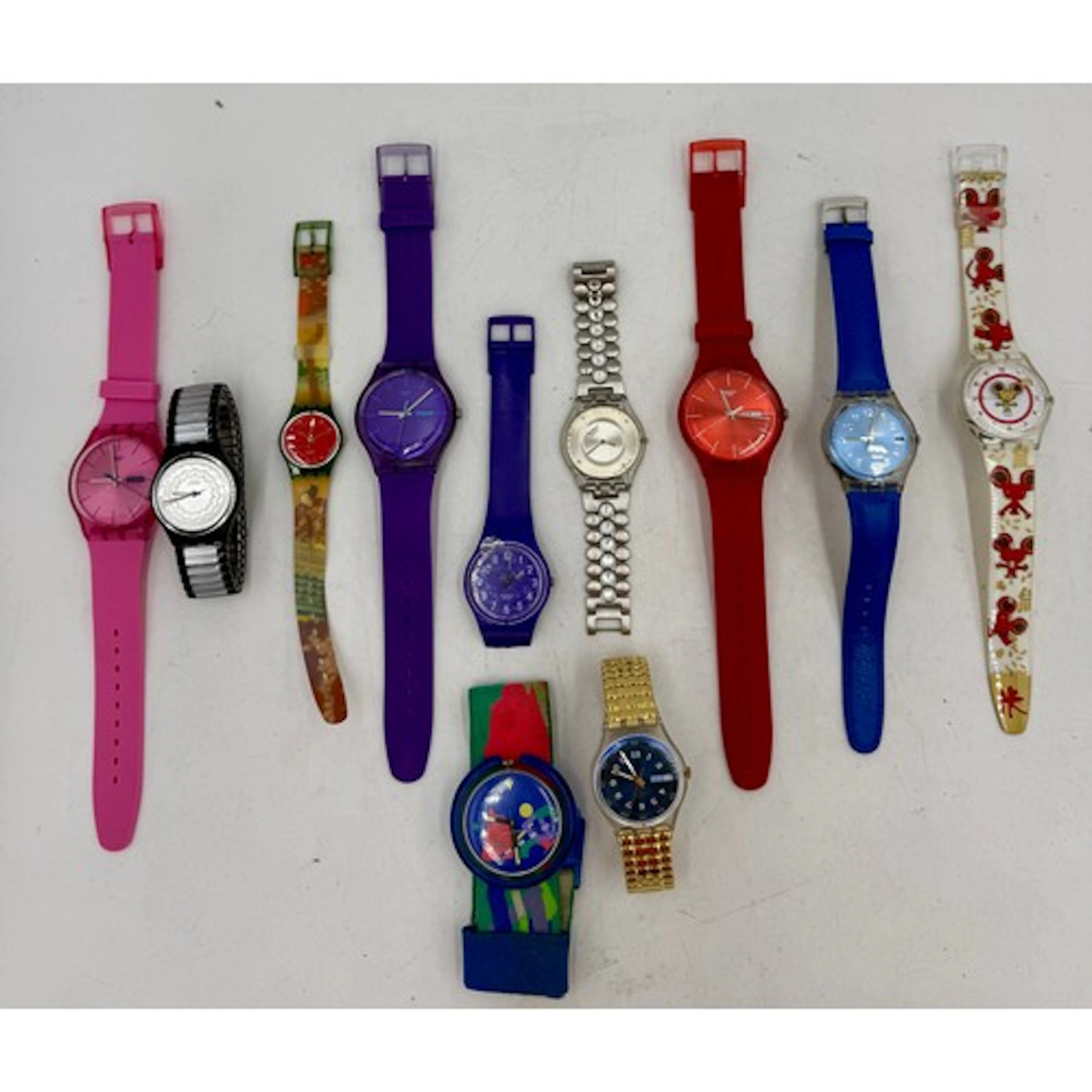 Eleven collectable Swatch watches.