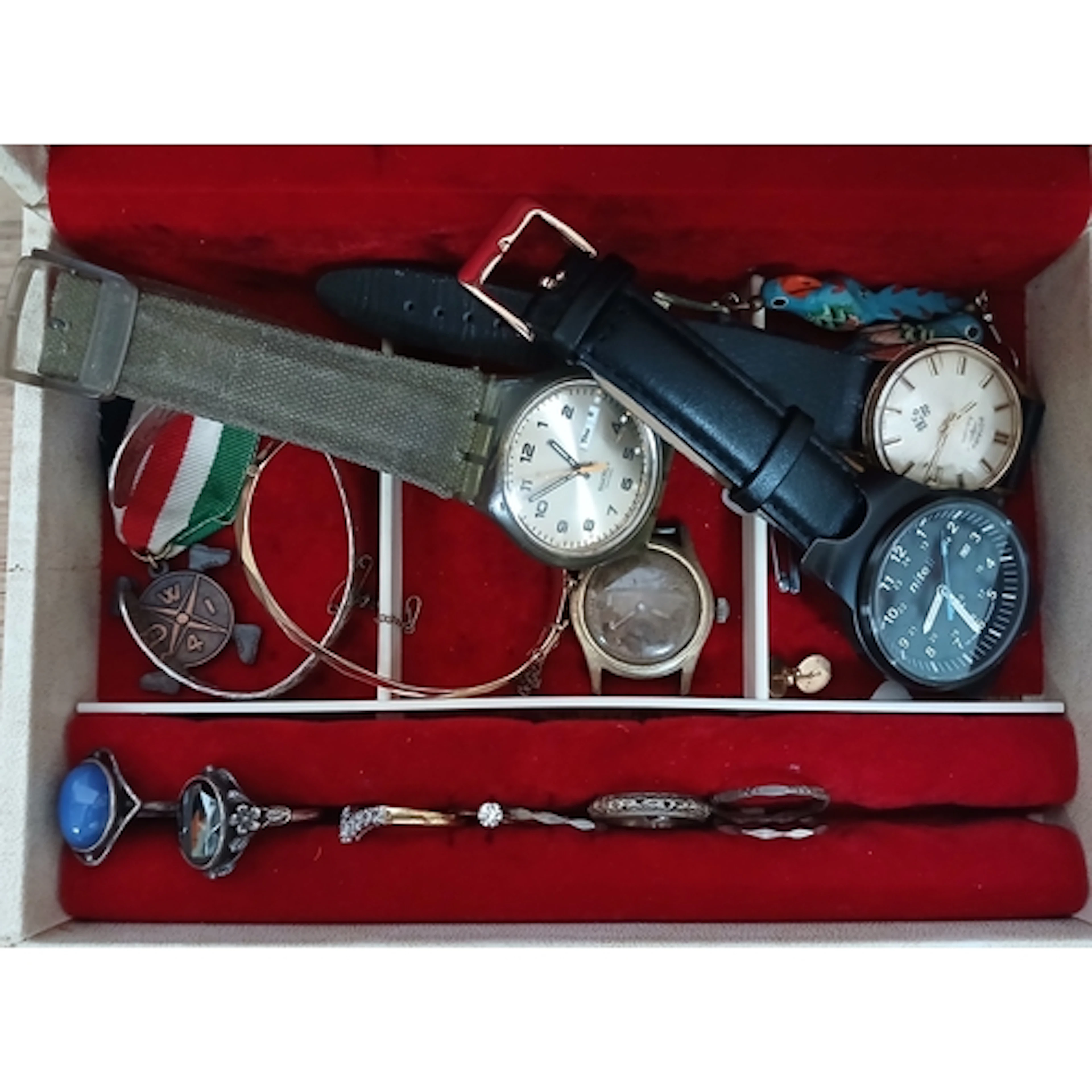 A jewellery box containing vintage watches, costume jeweller...