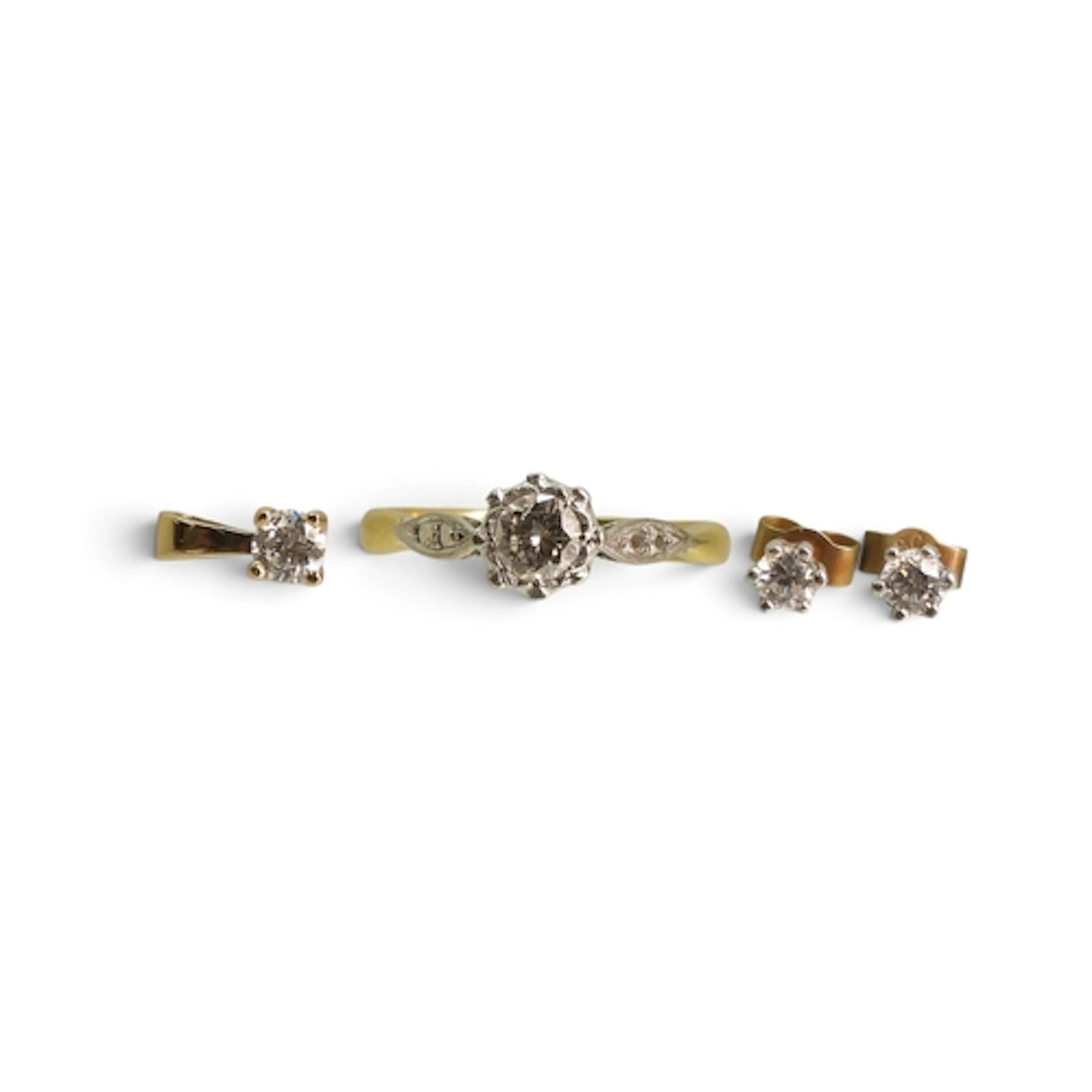 An 18ct and platinum illusion set diamond ring, set with an ...