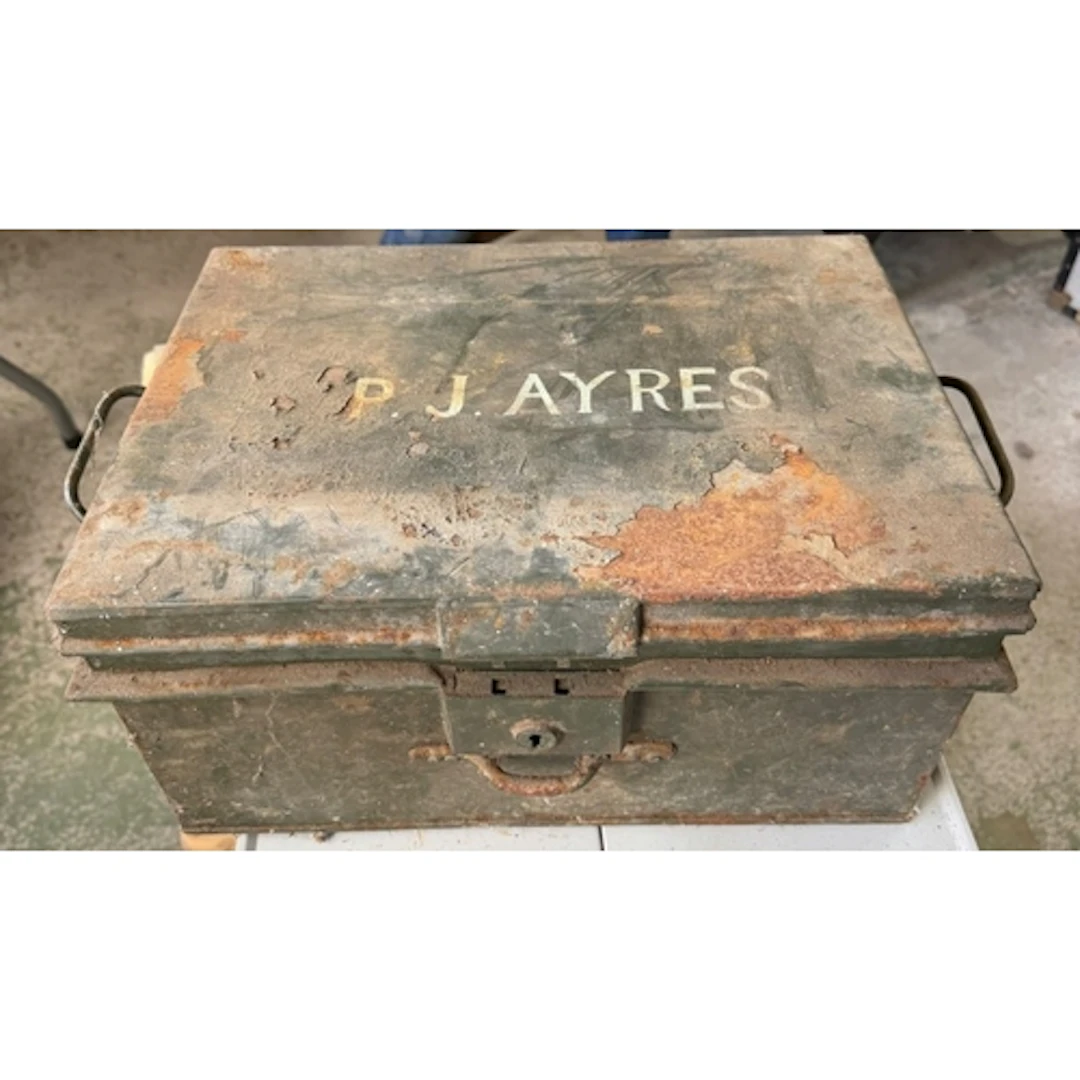 A Vintage metal ammunition storage box opening up to hand to...