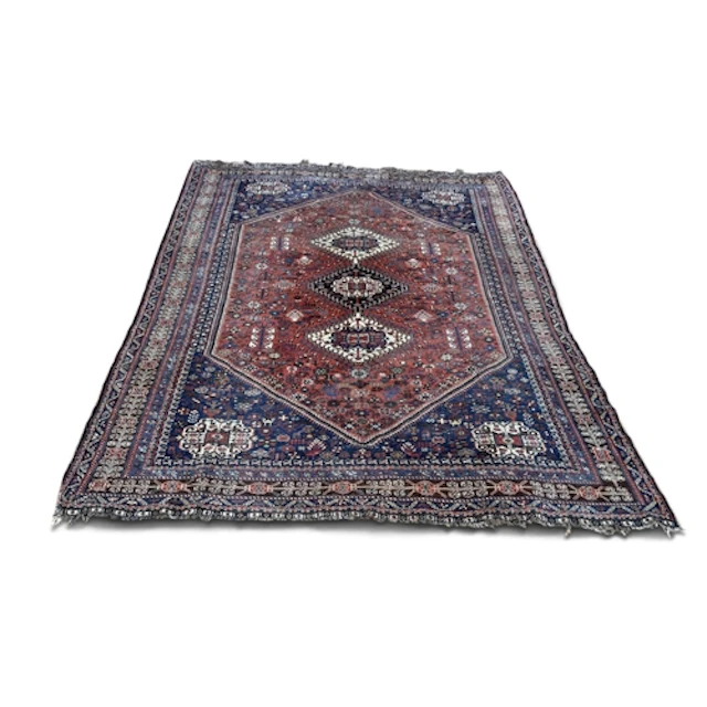 A PERSIAN CARPET 302cm x 202cm