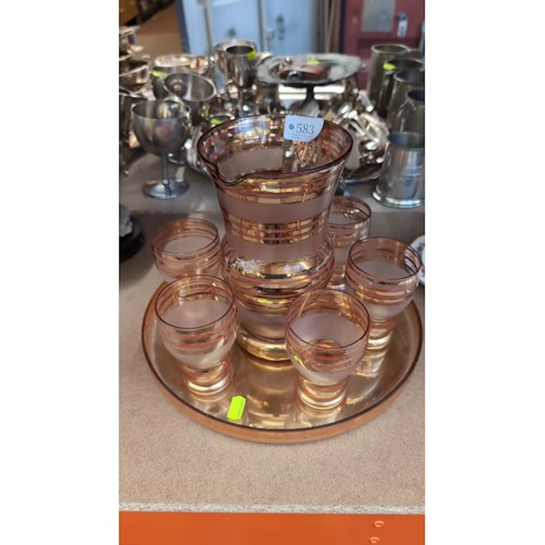 Amber glass lemonade set comprising a handled jug with pouri...