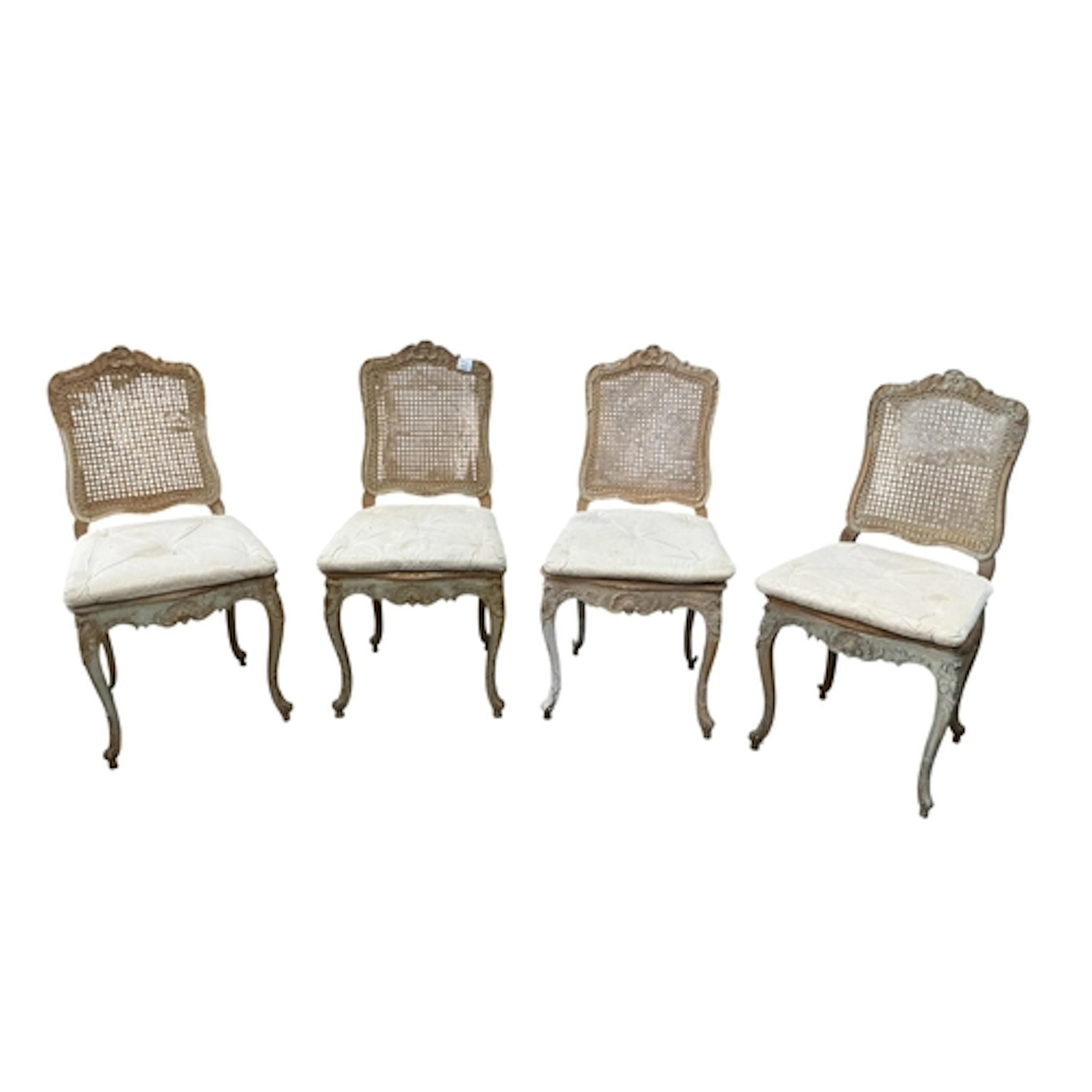 A set of four Louis XV style beech caned seat and back dinin...