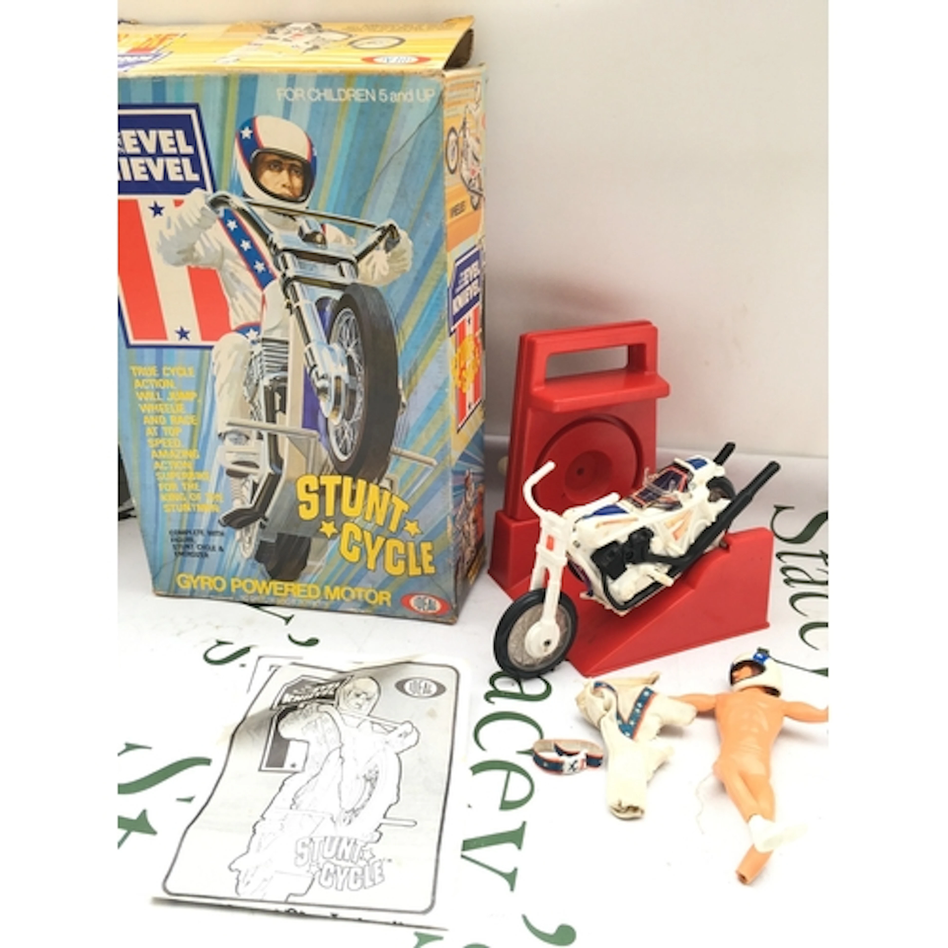 A Boxed Ideal Toys Evel Knivevel Stunt Cycle. Figure Is Dama...