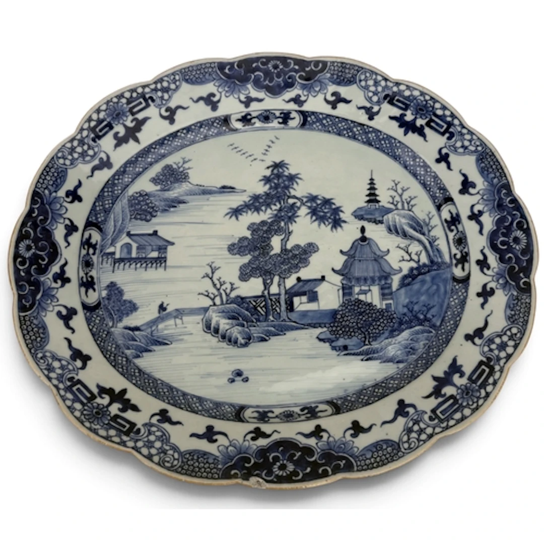 A CHINESE EXPORT BLUE AND WHITE OVAL MEAT DISH, QIANLONG Pai...