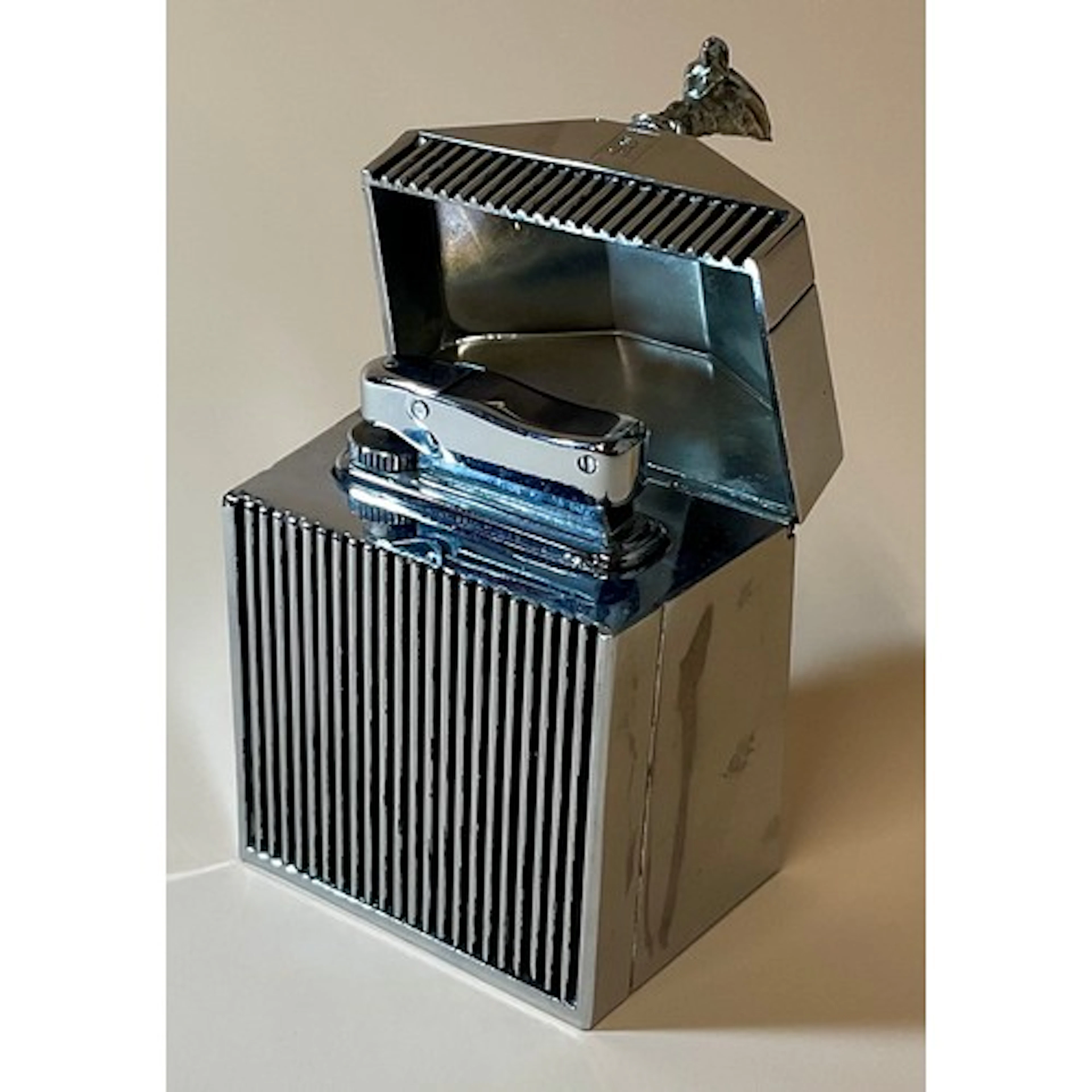 Automobilia - a chromed Rolls Royce table lighter, modelled ...