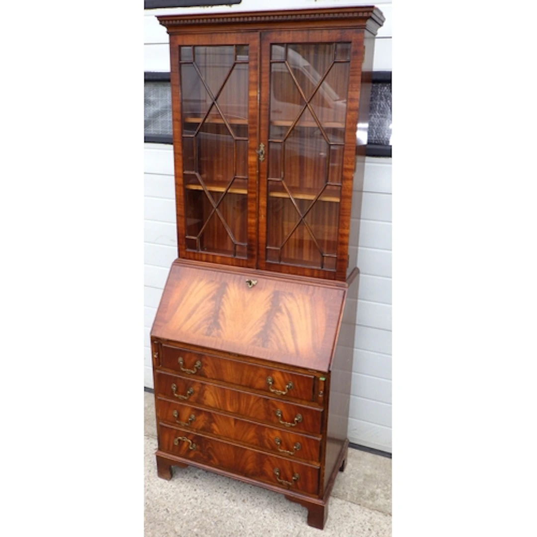 A Reprodux mahogany bureau bookcase, cornice a/f, 79cm wide