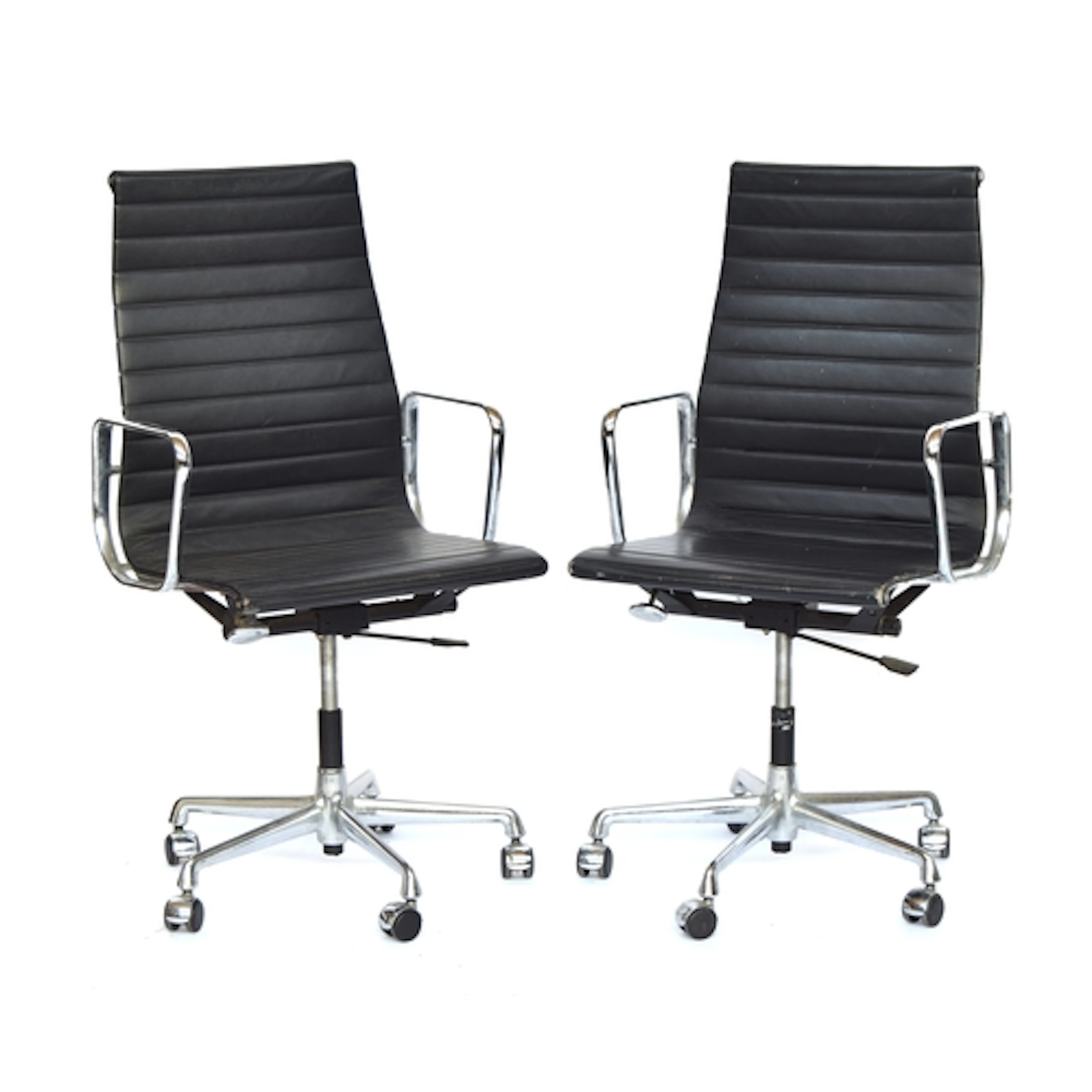 Charles & Ray Eames for Vitra, a pair of chrome and black le...
