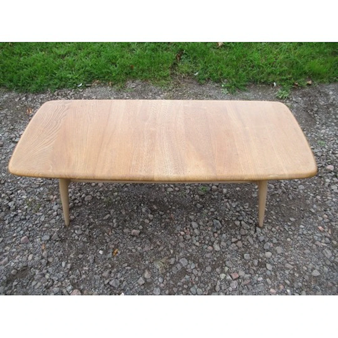 An Ercol mid century style coffee table width 40ins x 16ins,...