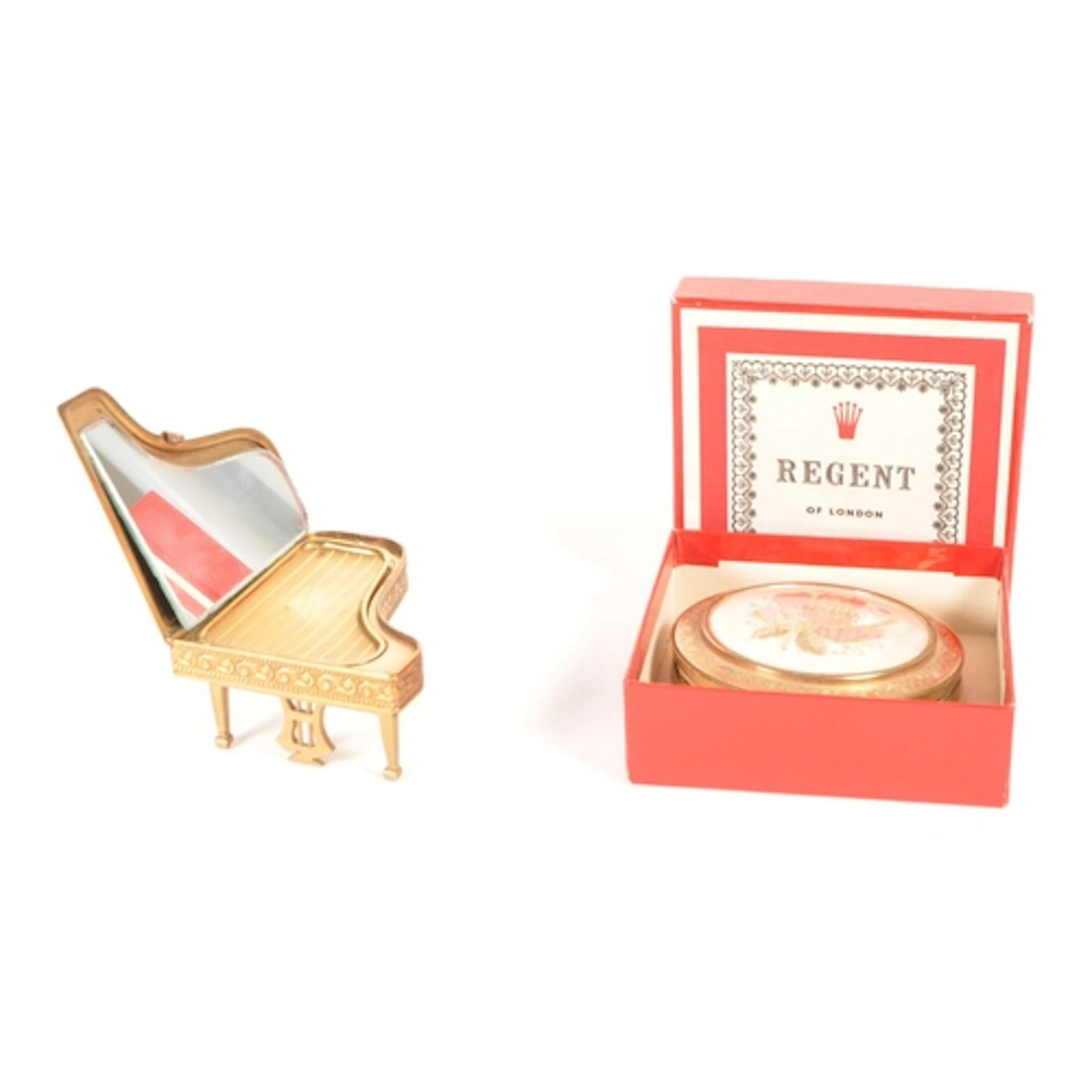 Two vintage mid century beauty compact cases, comprised of a...
