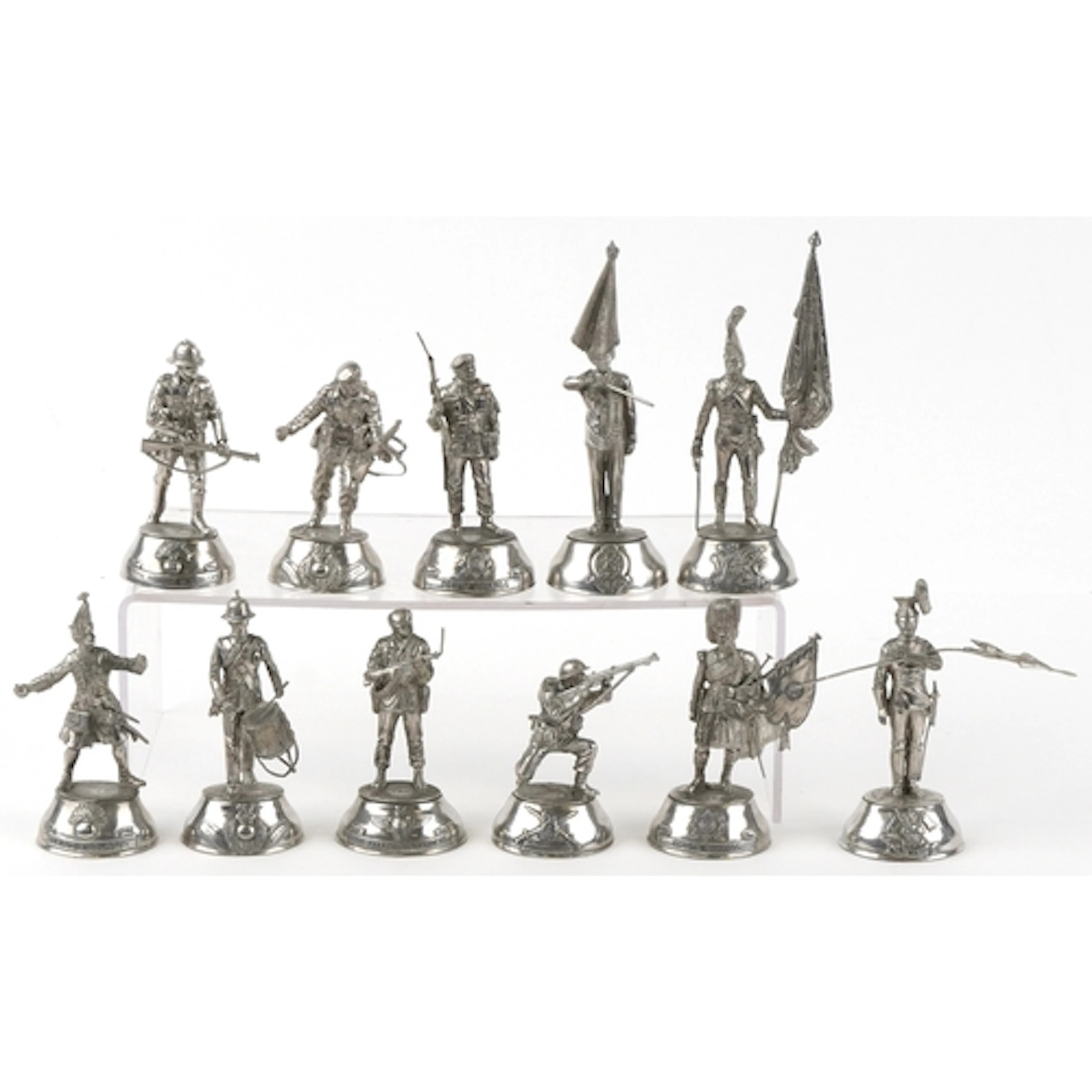 Eleven Buckingham pewter military figures designed by Charle...