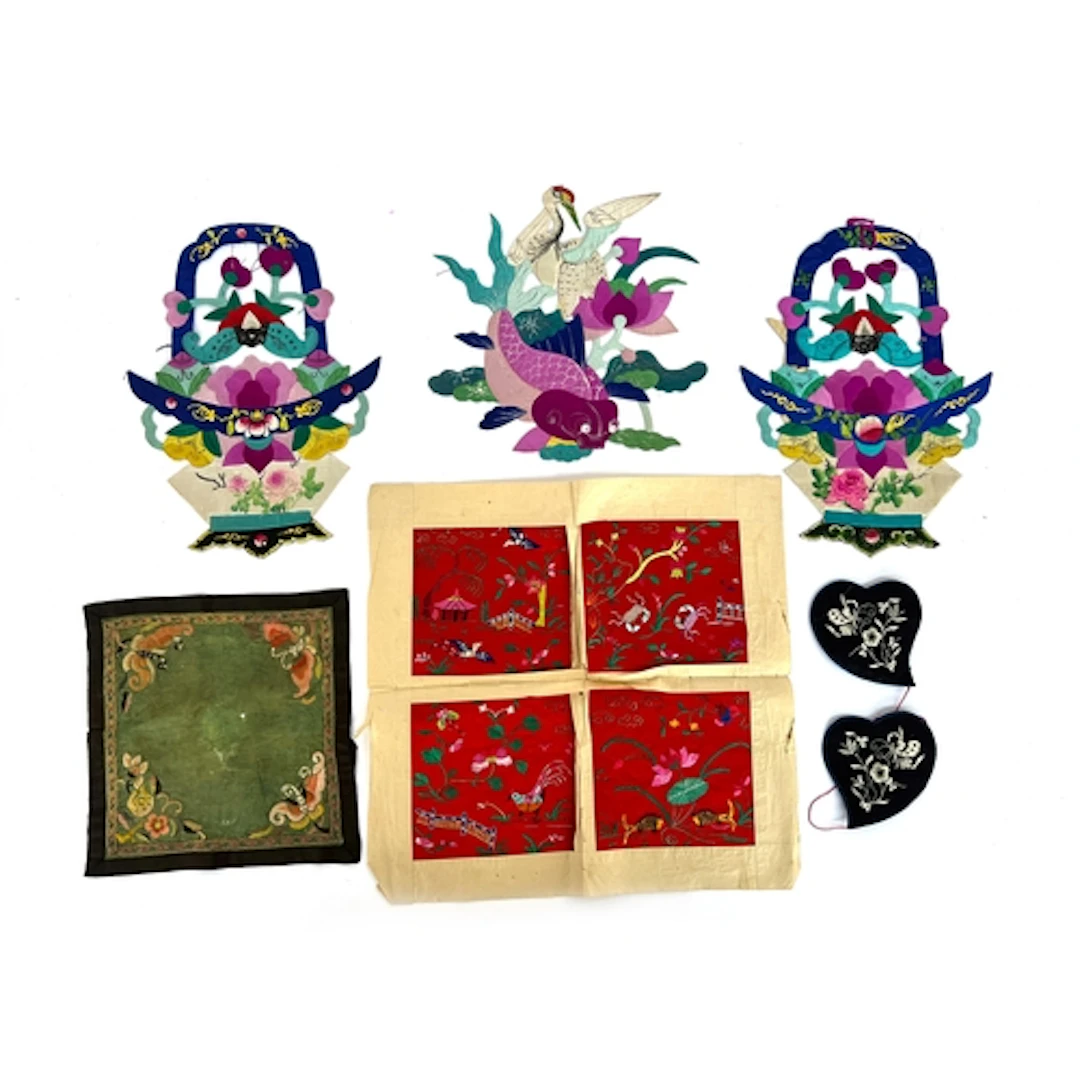 Three Chinese painted silk appliques, two in the form of bat...