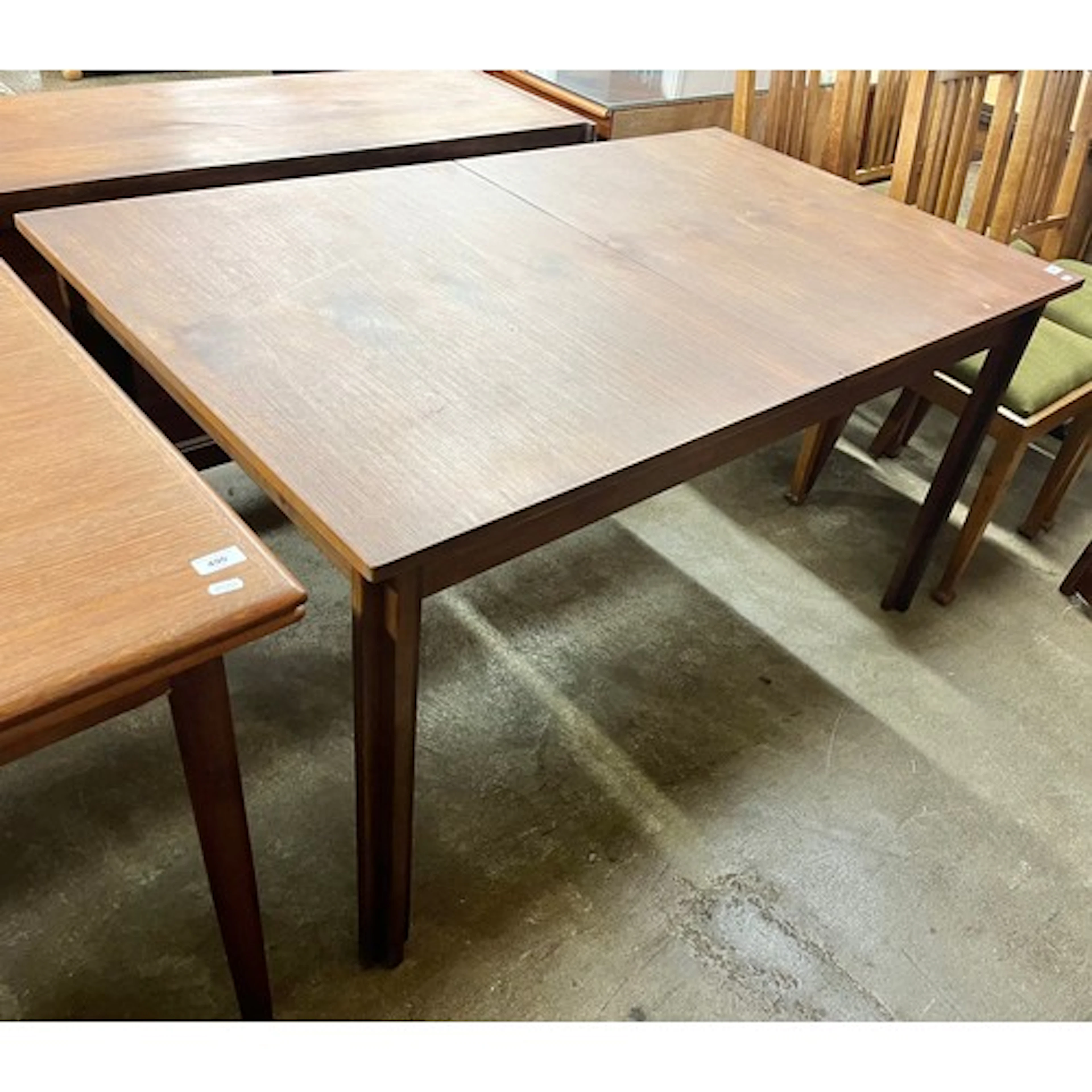 Mid-century teak extending dining table, with surprise leaf,...