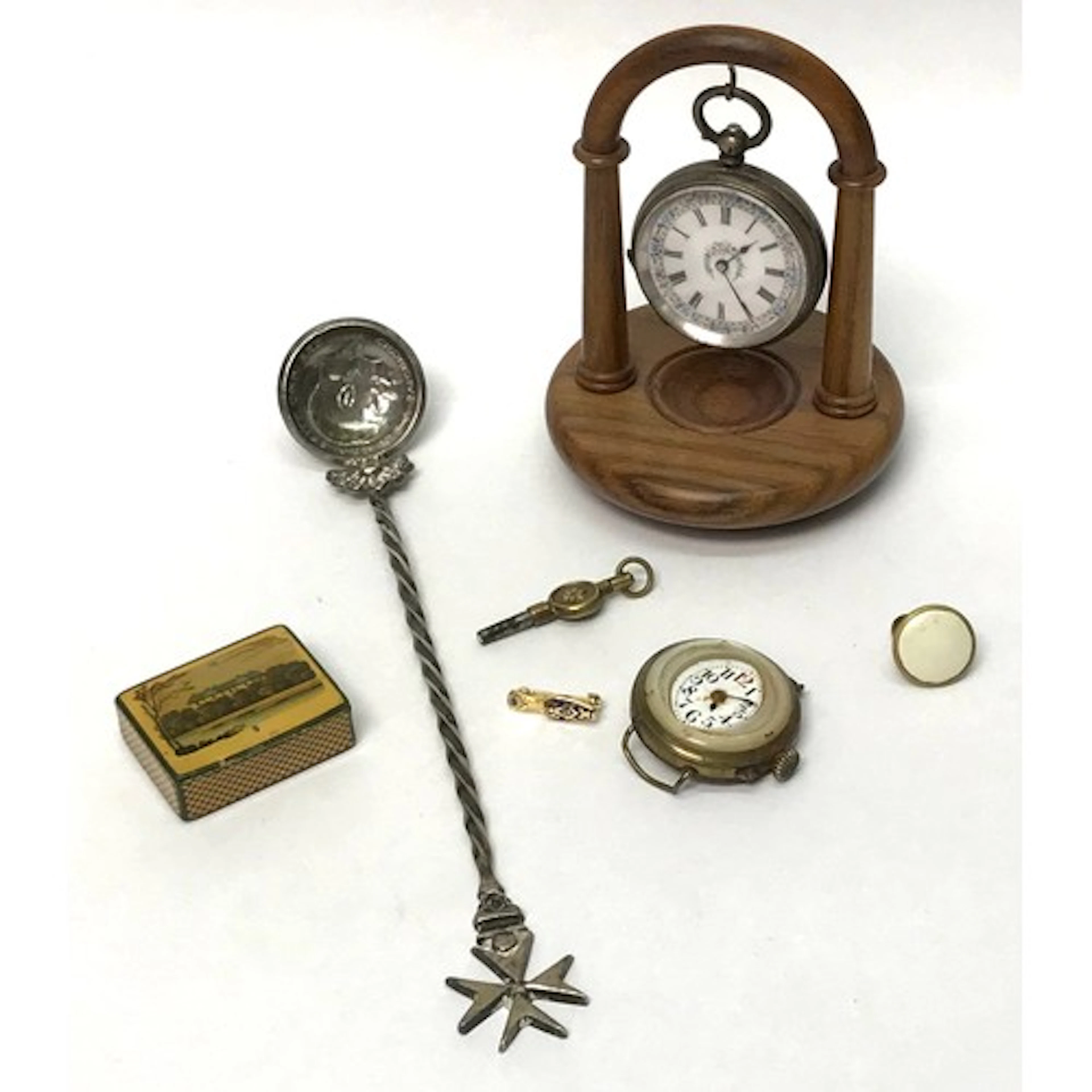 A collectors' lot incl a gold plated pin set trench style wa...