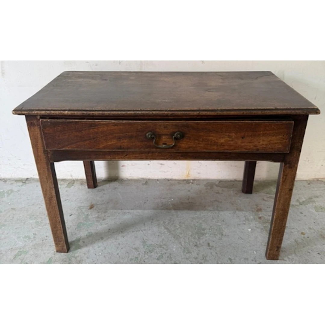 An oak single drawer side table. Height 49cm 73x40cm.