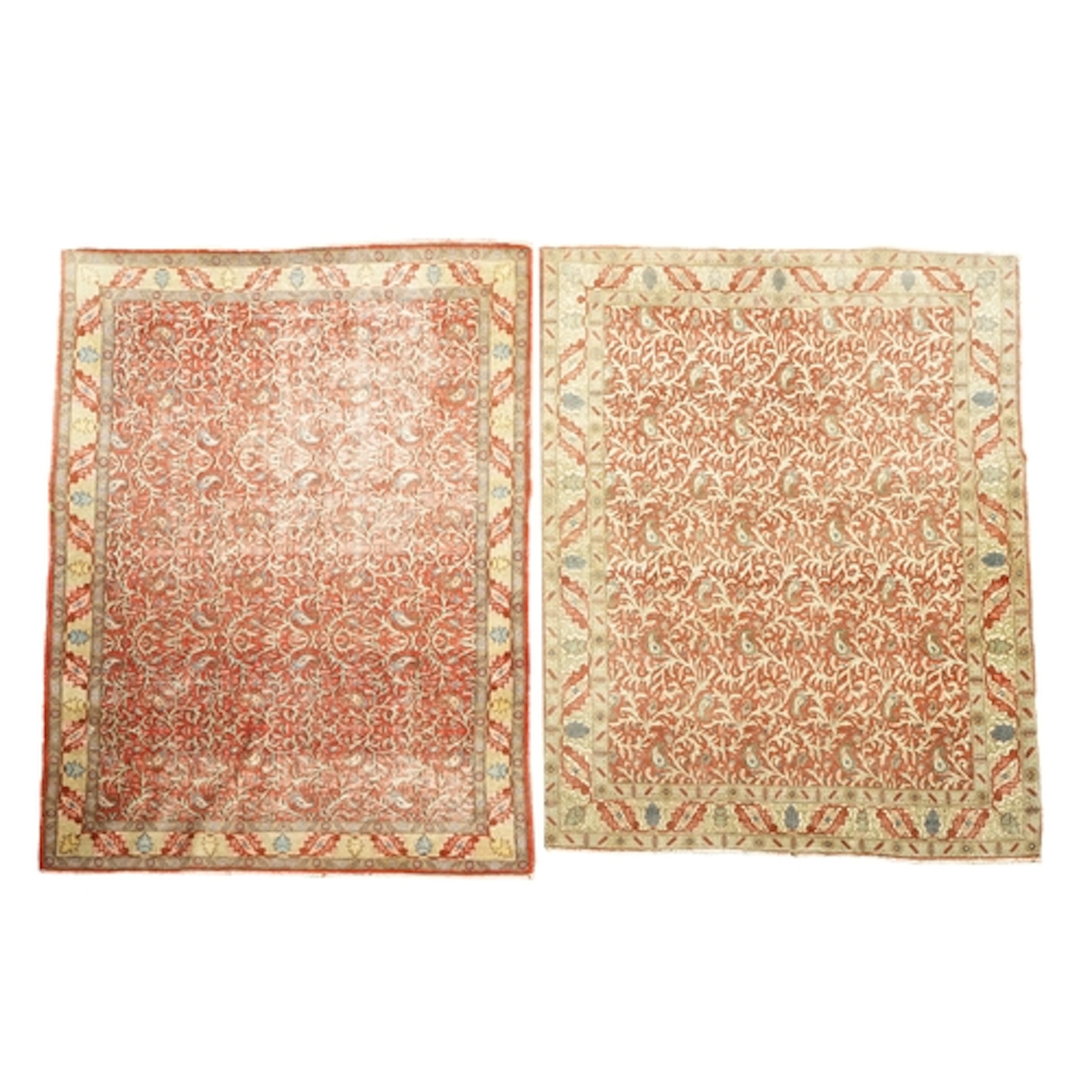 A near pair of red ground Qum carpets, early 20th century, t...
