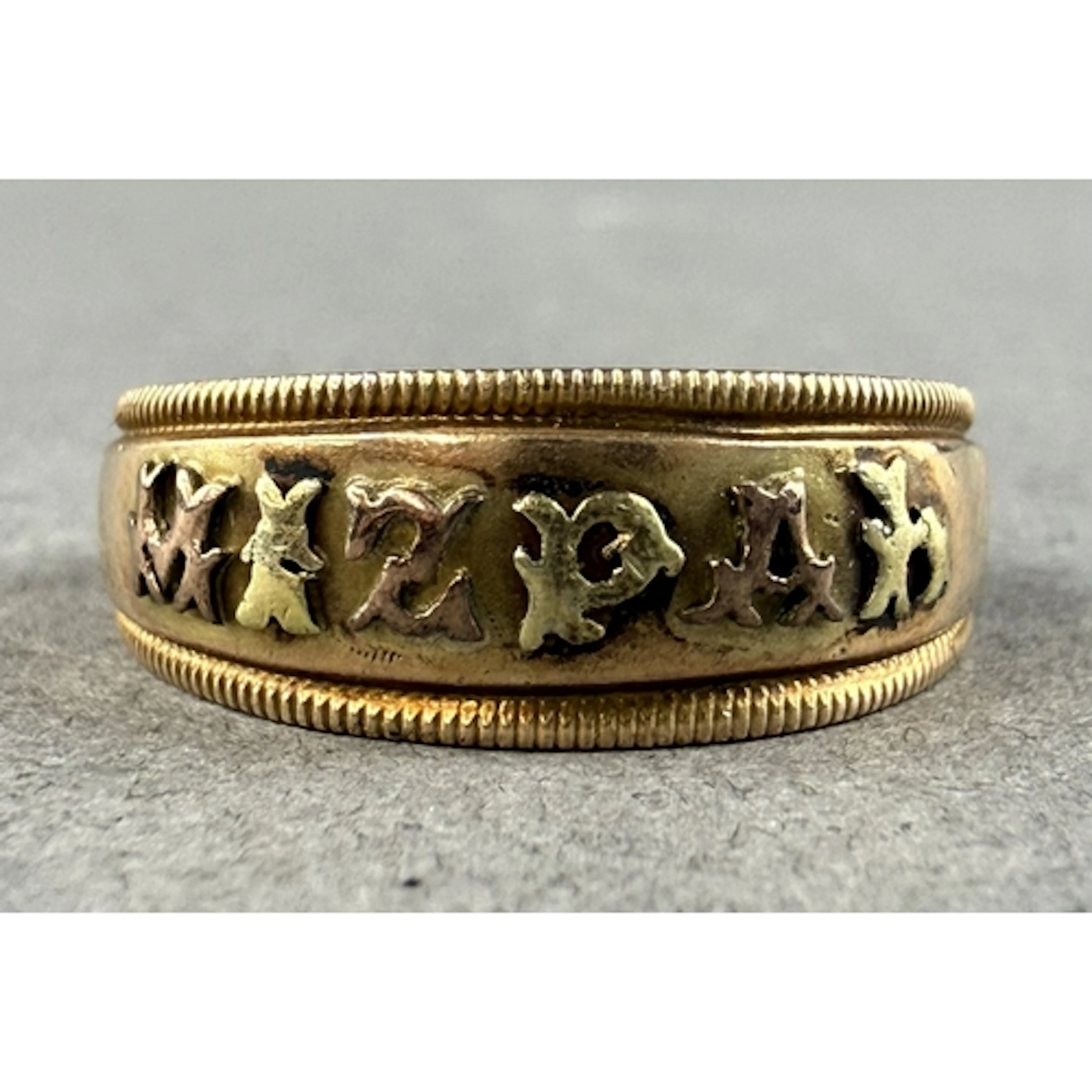Jewellery: a 9ct yellow gold 'MIZPAH' ring, Birmingham 1885,...