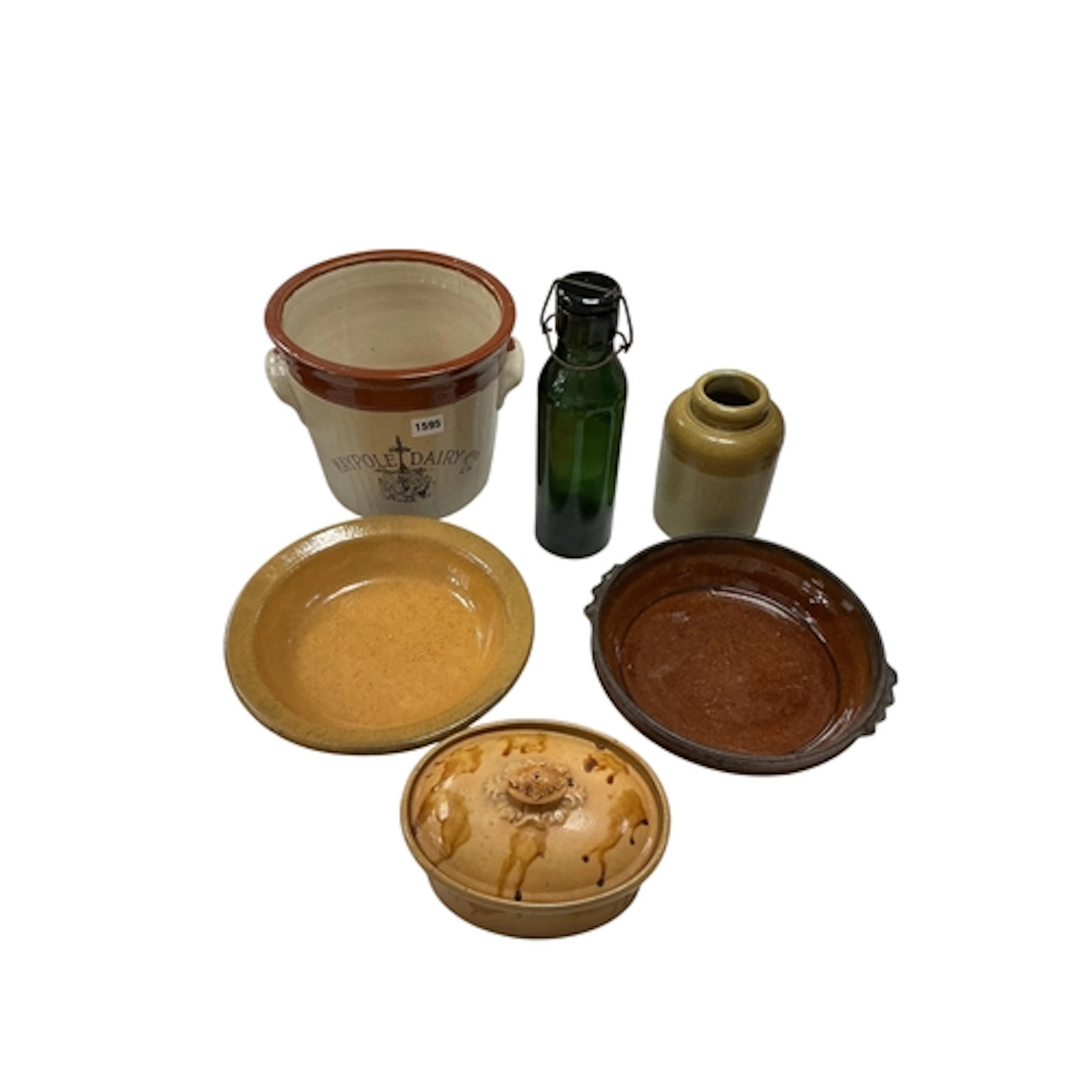 A collection of treacleware glazed pottery to include a Maol...