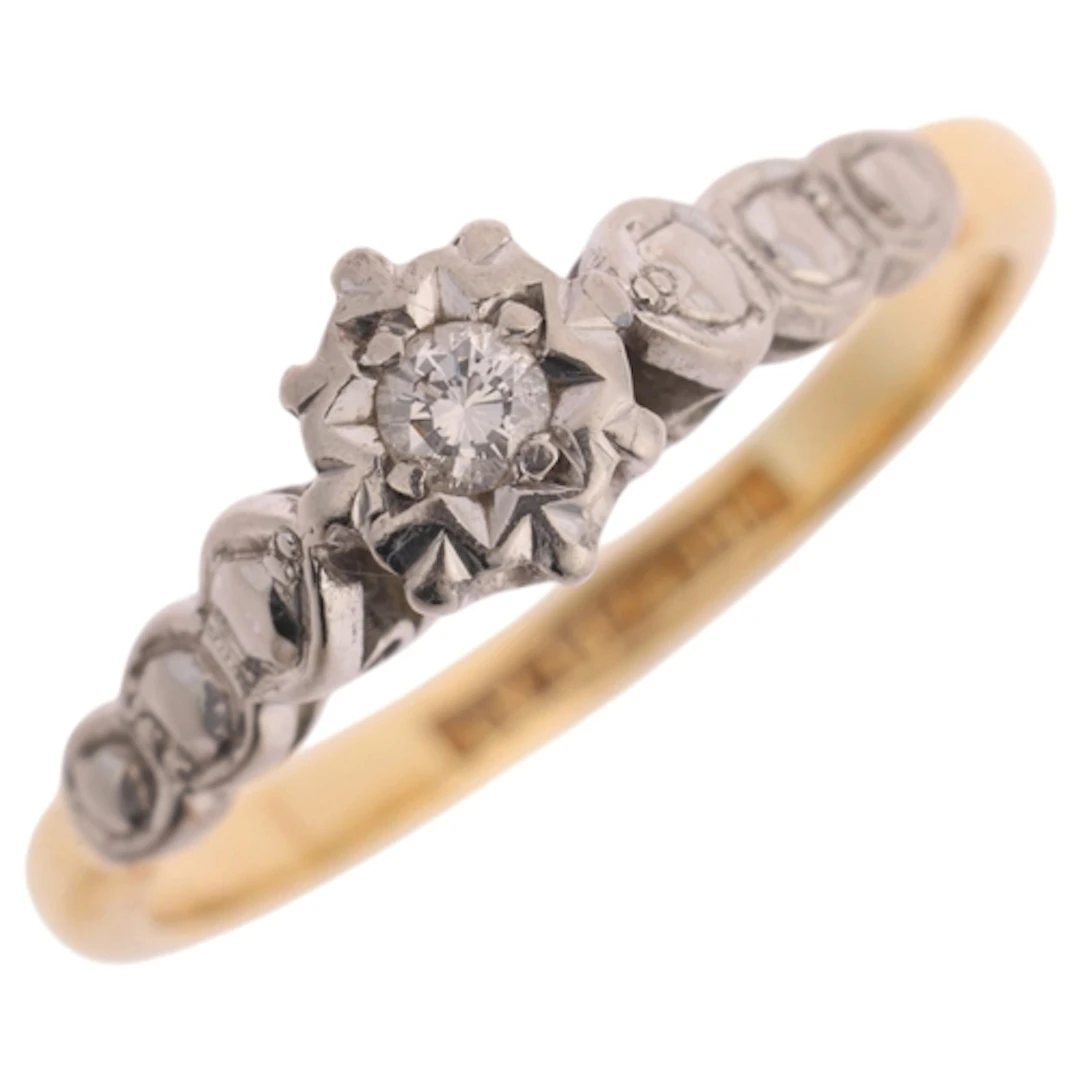 An 18ct gold 0.25ct single stone diamond ring, platinum-topp...