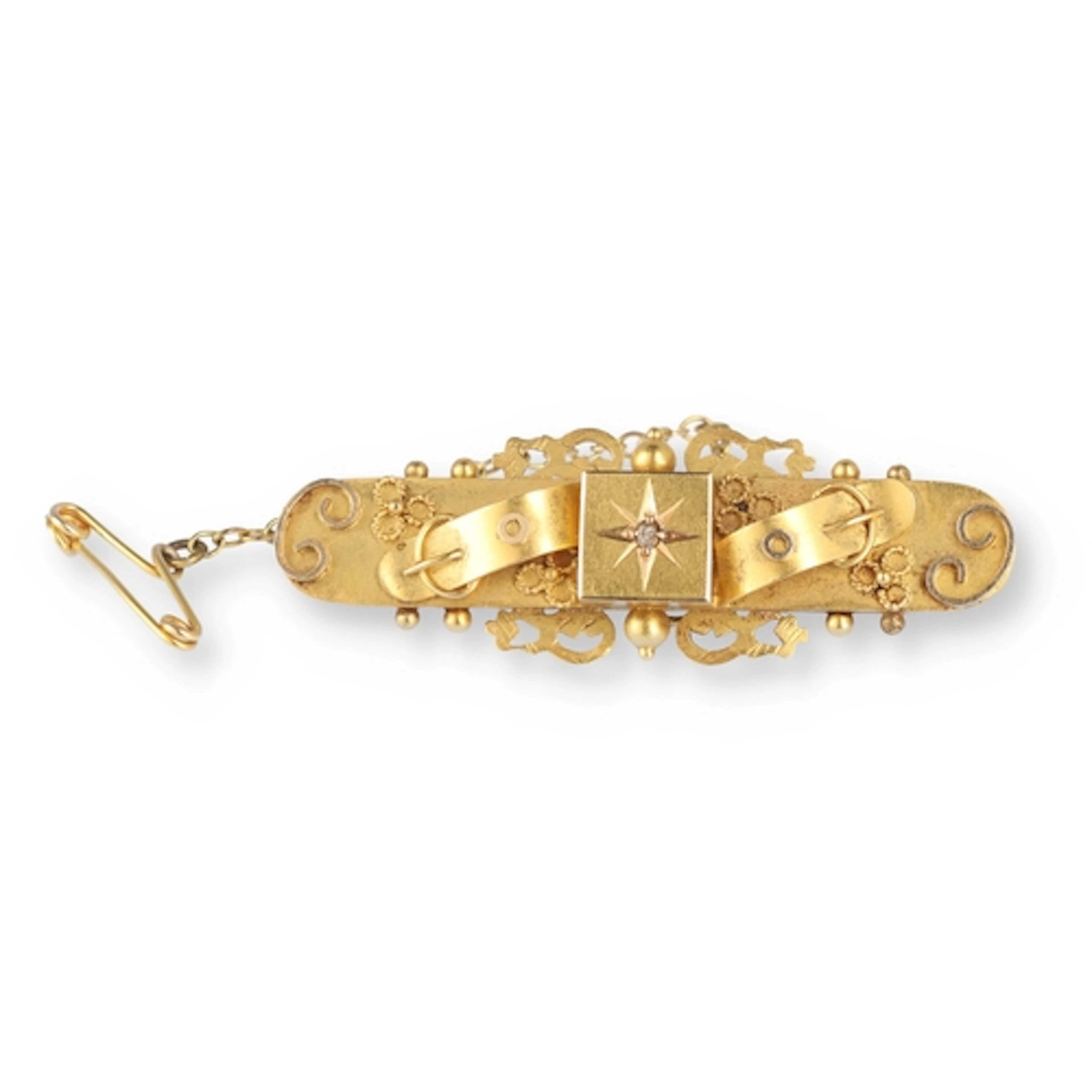 AN EDWARDIAN 15 CARAT GOLD BROOCH Presented to Mrs R Giggins...