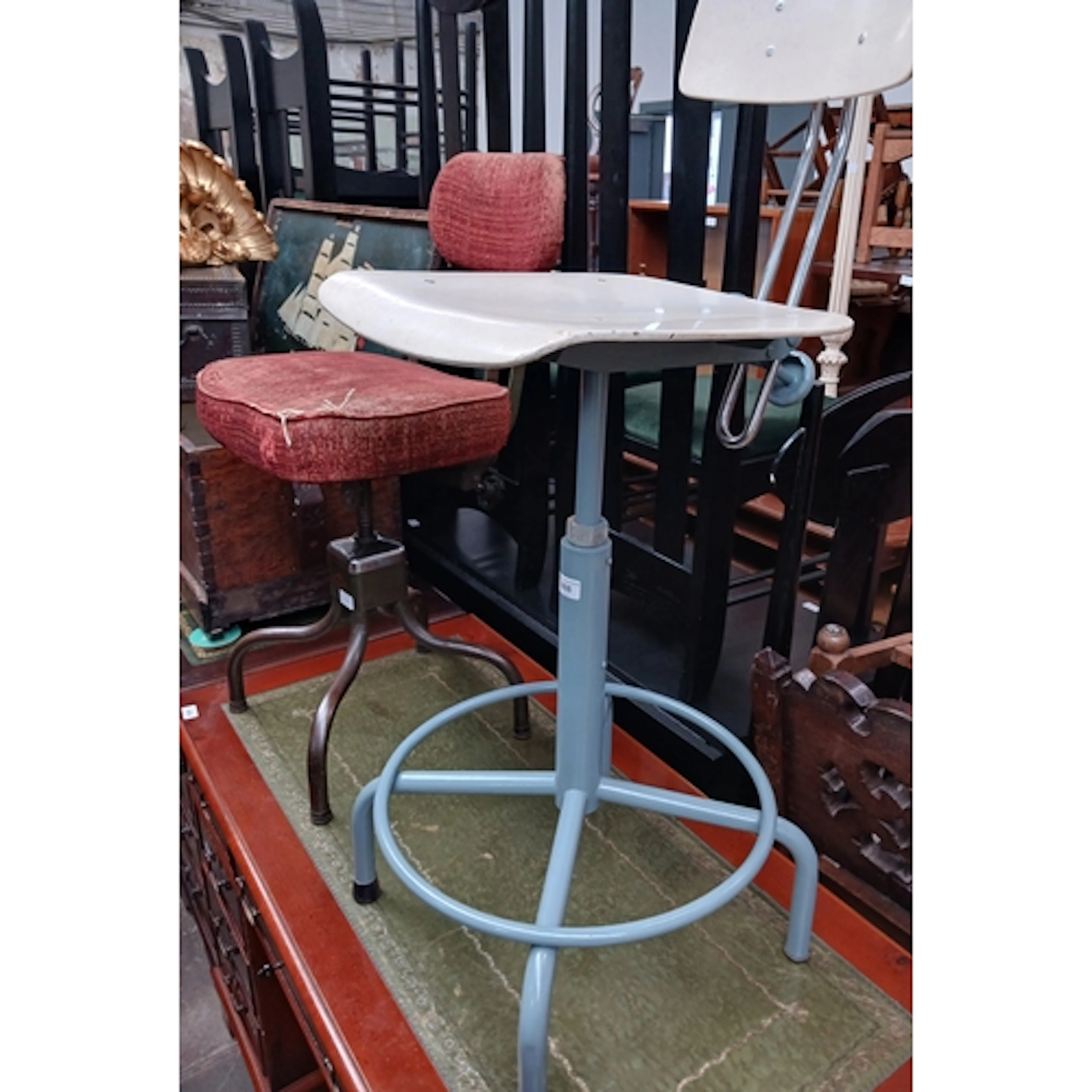 Two engineer type swivel chairs.