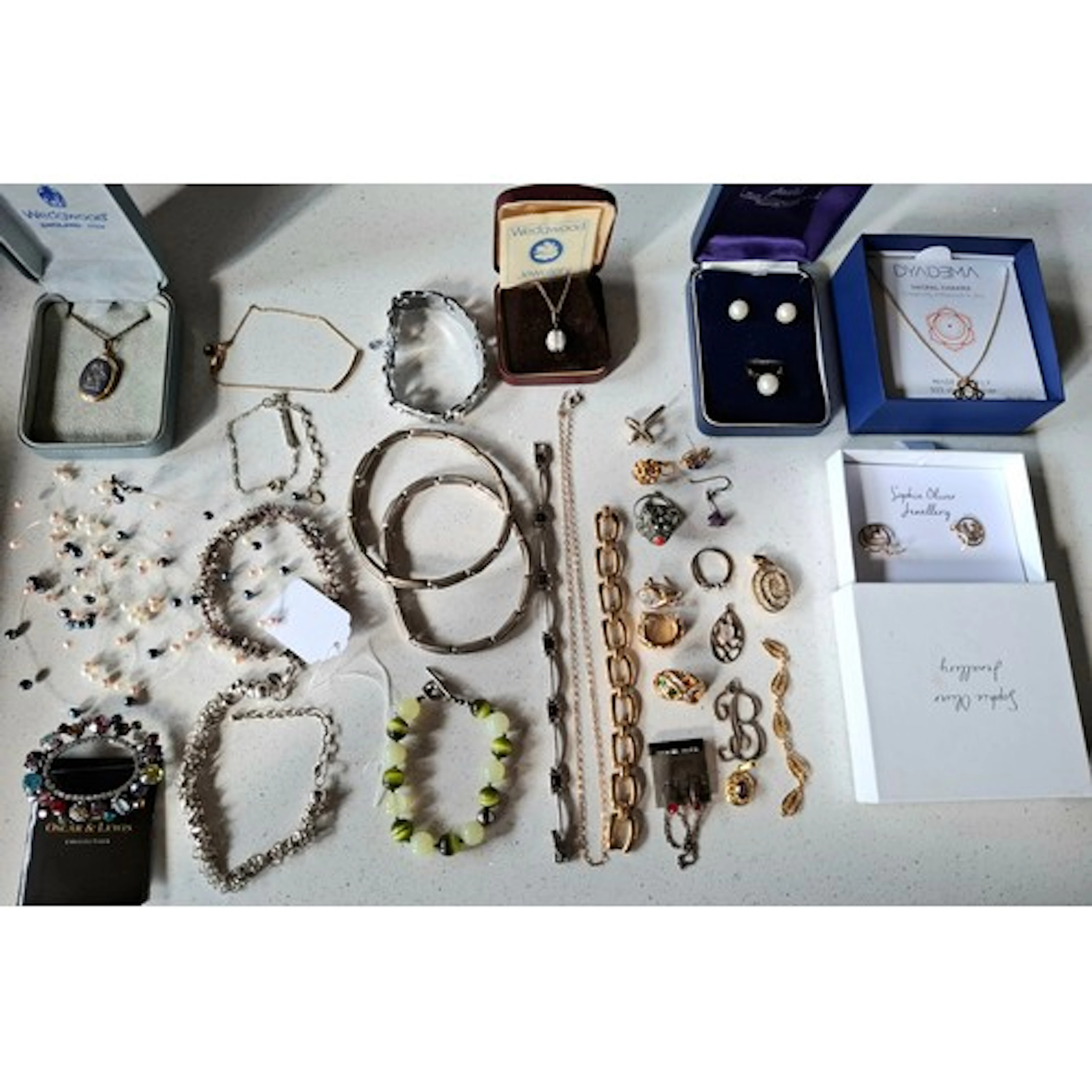 A quantity of costume jewellery to include 2 Wedgwood neckla...