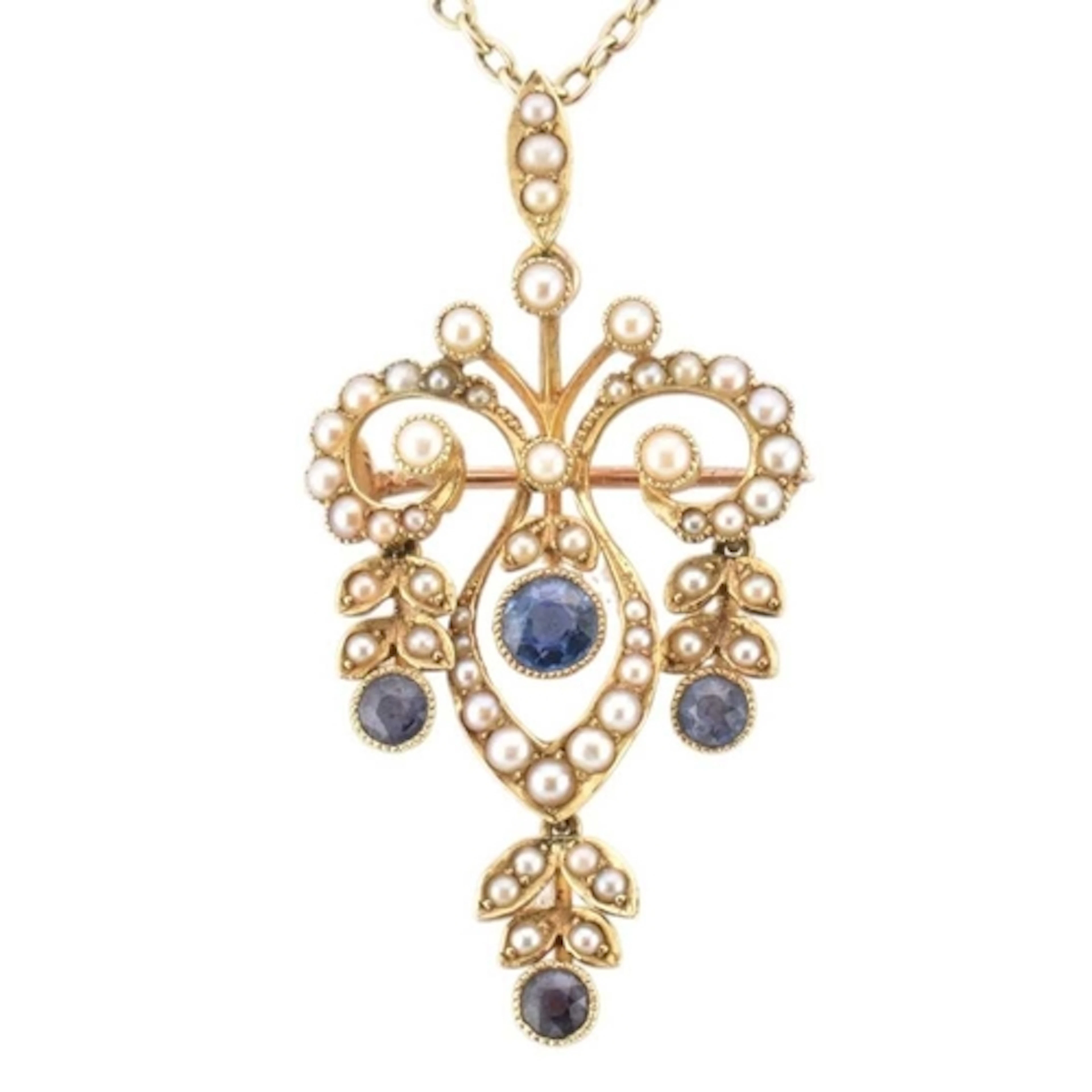 An Edwardian Art Nouveau 15ct gold sapphire and pearl brooch...