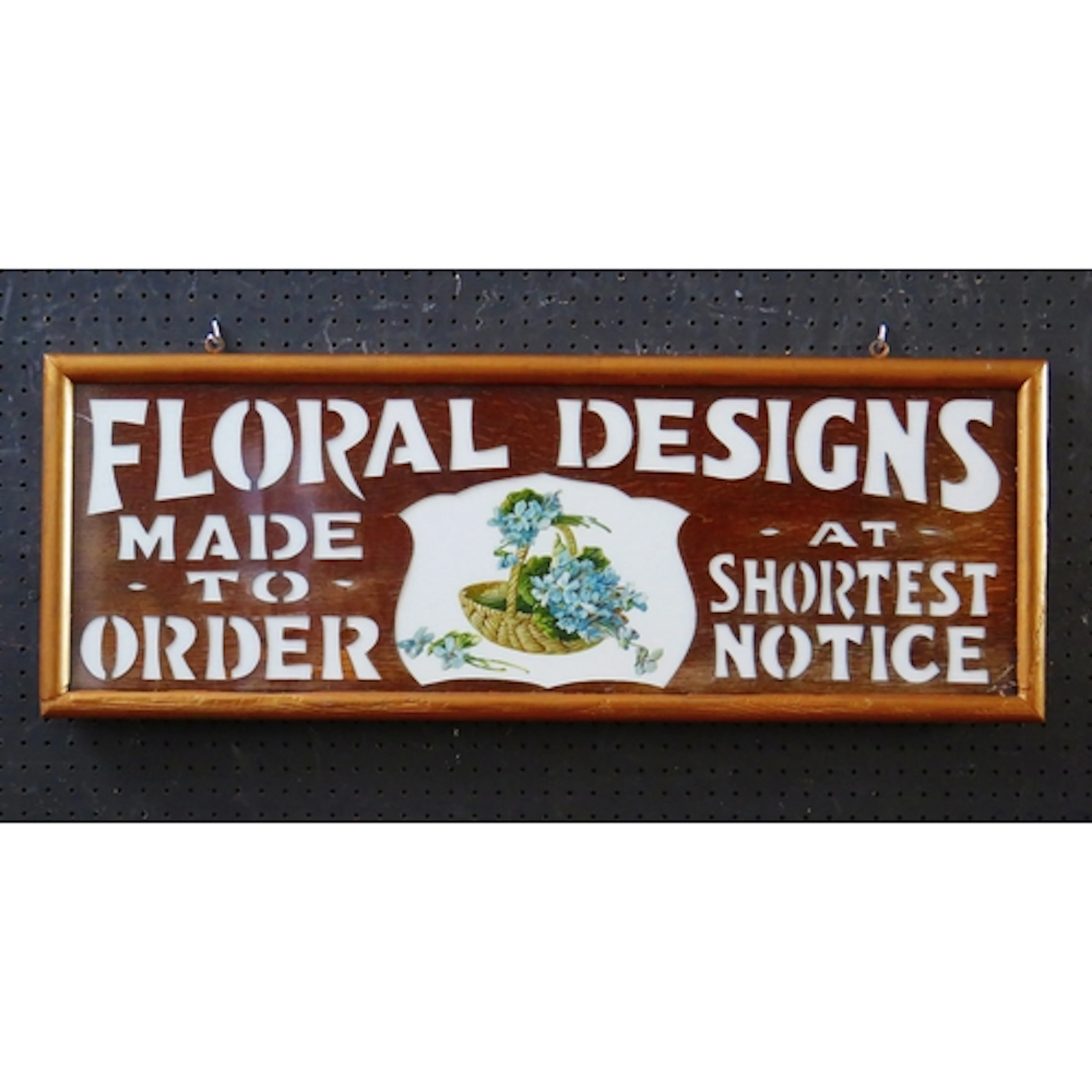 "Floral designs Made To Order At Short Notice" - a milk glas...
