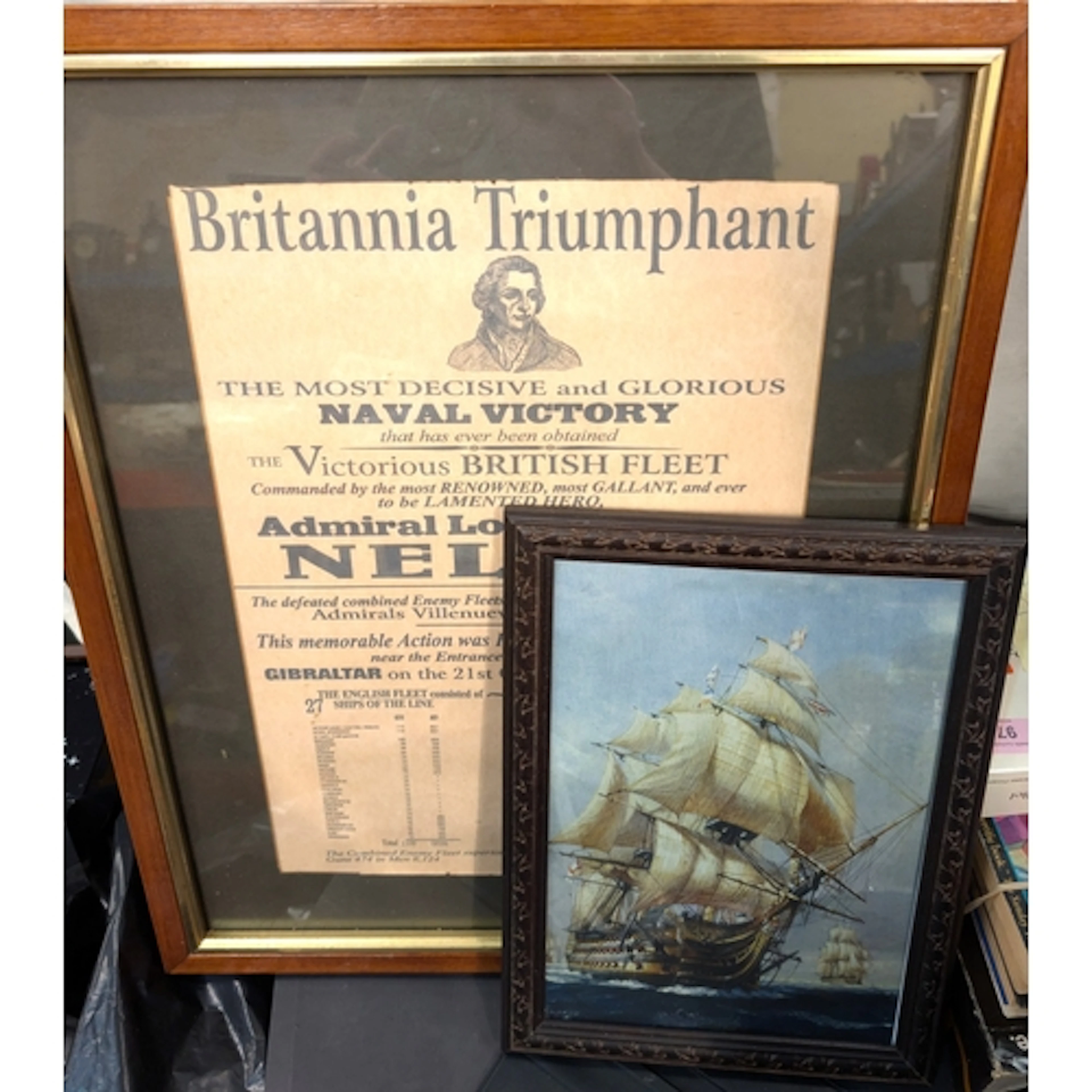 A cased diorama on golf clock, Nelson framed poster, two Afr...